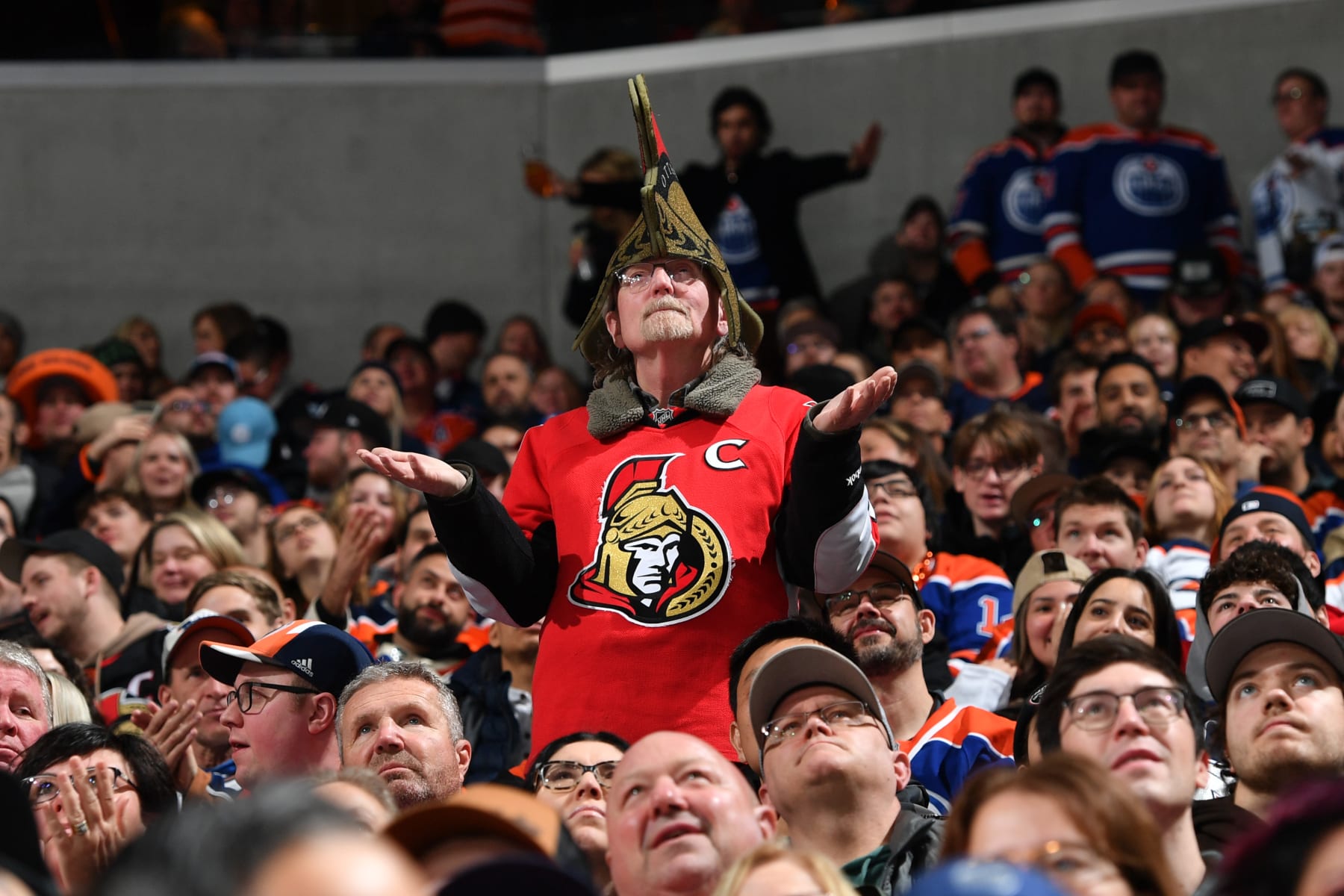 EDMONTON, CANADA - JANUARY 6: A dejected Ottawa Senators fan looks on during the game against the Edmonton Oilers at Rogers Place on January 06, 2024, in Edmonton, Alberta, Canada. (Photo by Andy Devlin/NHLI via Getty Images)
