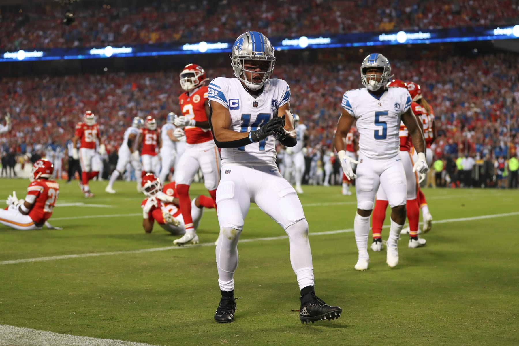 KANSAS CITY, MO - SEPTEMBER 07: Detroit Lions wide receiver Amon-Ra St. Brown (14) celebrates a 9-yard touchdown reception in the first quarter of an NFL game between the Detroit Lions and Kansas City Chiefs on Sep 7, 2023 at GEHA Field at Arrowhead Stadium in Kansas City, MO. (Photo by Scott Winters/Icon Sportswire via Getty Images)