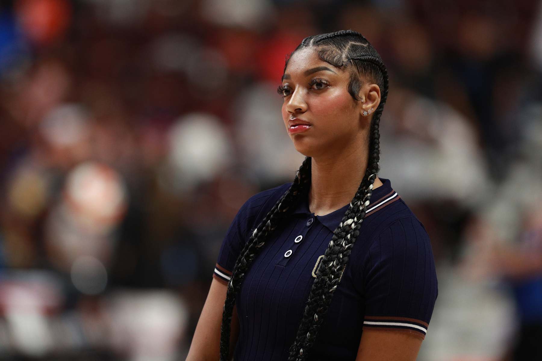 UNCASVILLE, CT - SEPTEMBER 19: Angel Reese #5 of the Chicago Sky looks on during the game against the Connecticut Sun on September 19, 2024 at the Mohegan Sun Arena in Uncasville, Connecticut. NOTE TO USER: User expressly acknowledges and agrees that, by downloading and or using this photograph, User is consenting to the terms and conditions of the Getty Images License Agreement. Mandatory Copyright Notice: Copyright 2024 NBAE (Photo by Chris Marion/NBAE via Getty Images)