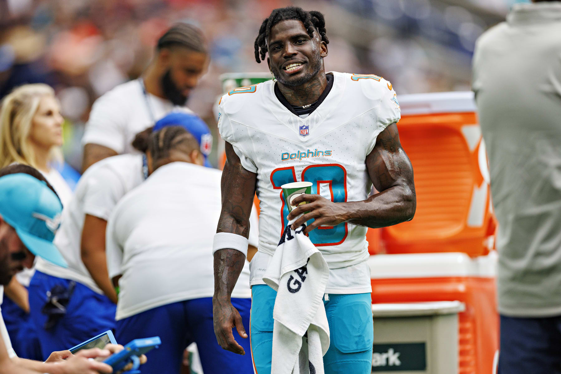 HOUSTON, TEXAS - AUGUST 19:  Tyreek Hill #10 of the Miami Dolphins on the sidelines during the preseason game against the Houston Texans at NRG Stadium on August 19, 2023 in Houston, Texas. The Dolphins defeated the Texans 28-3.  (Photo by Wesley Hitt/Getty Images)