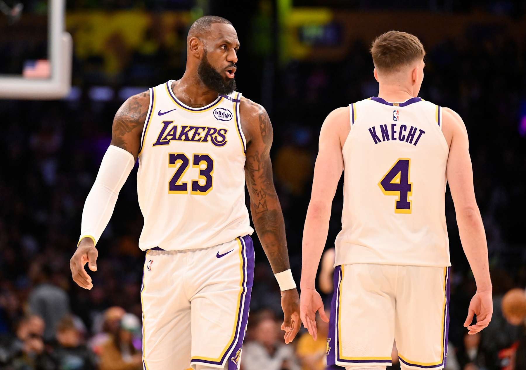 LOS ANGELES, CALIFORNIA - OCTOBER 26: LeBron James #23 of the Los Angeles Lakers talks to Dalton Knecht #4 while playing the Sacramento Kings at Crypto.com Arena on October 26, 2024 in Los Angeles, California.NOTE TO USER: User expressly acknowledges and agrees that, by downloading and or using this photograph, User is consenting to the terms and conditions of the Getty Images License Agreement. (Photo by John McCoy/Getty Images)