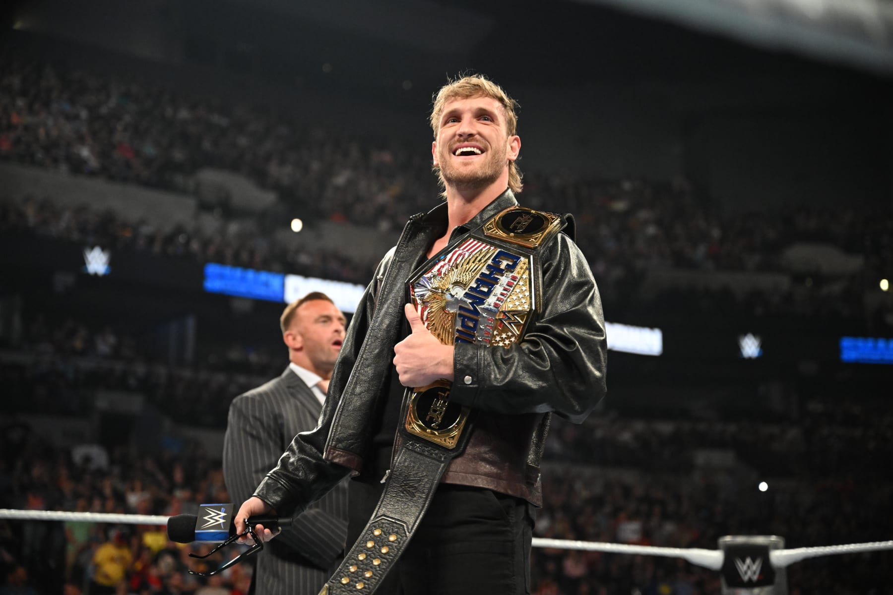 OMAHA, NEBRASKA - JULY 19: United States Champion Logan Paul makes his entrance during SmackDown at CHI Health Center on July 19, 2024 in Omaha, Nebraska.  (Photo by WWE/Getty Images)