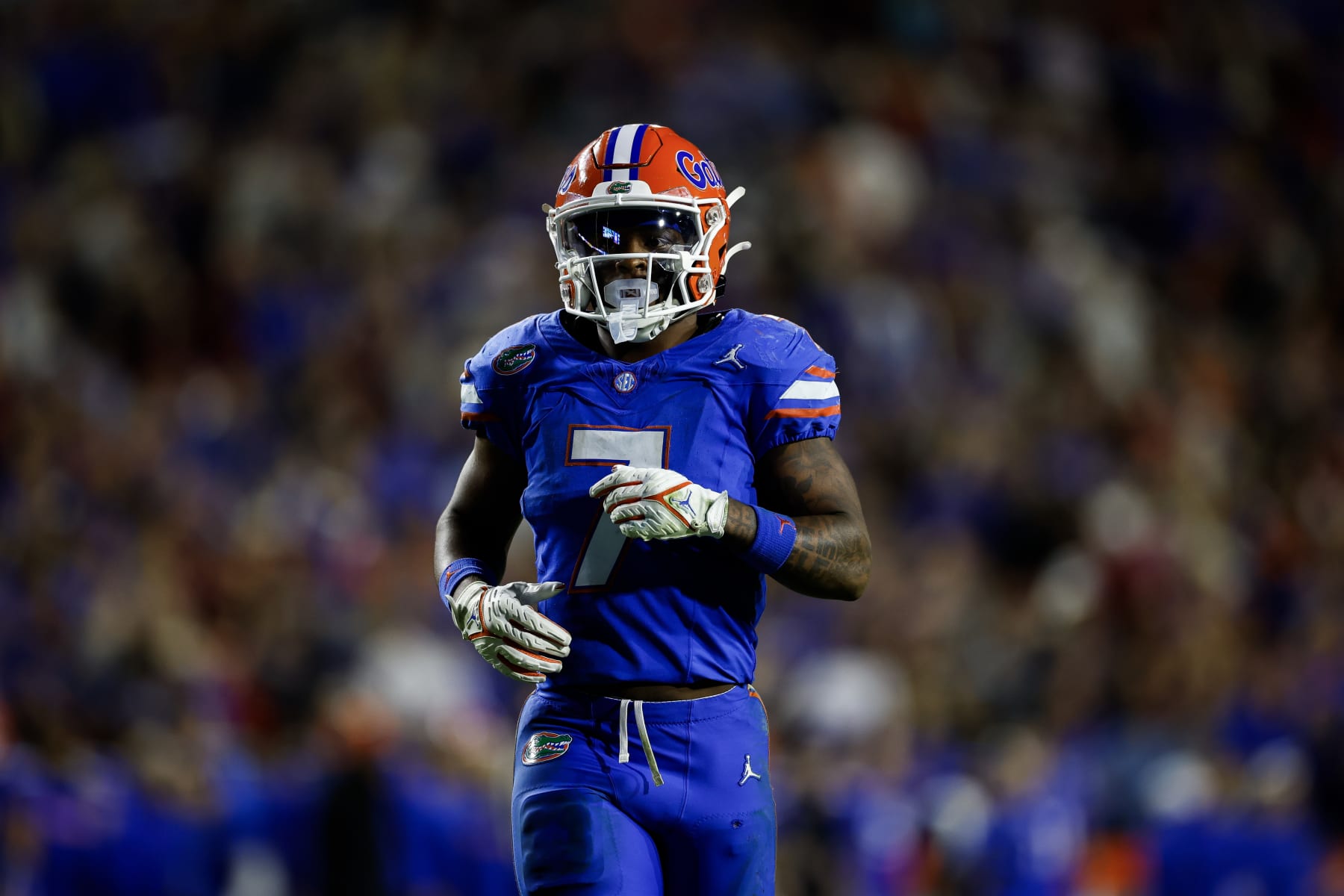 GAINESVILLE, FLORIDA - NOVEMBER 25: Trevor Etienne #7 of the Florida Gators looks on during the first half of a game against the Florida State Seminoles at Ben Hill Griffin Stadium on November 25, 2023 in Gainesville, Florida. (Photo by James Gilbert/Getty Images)