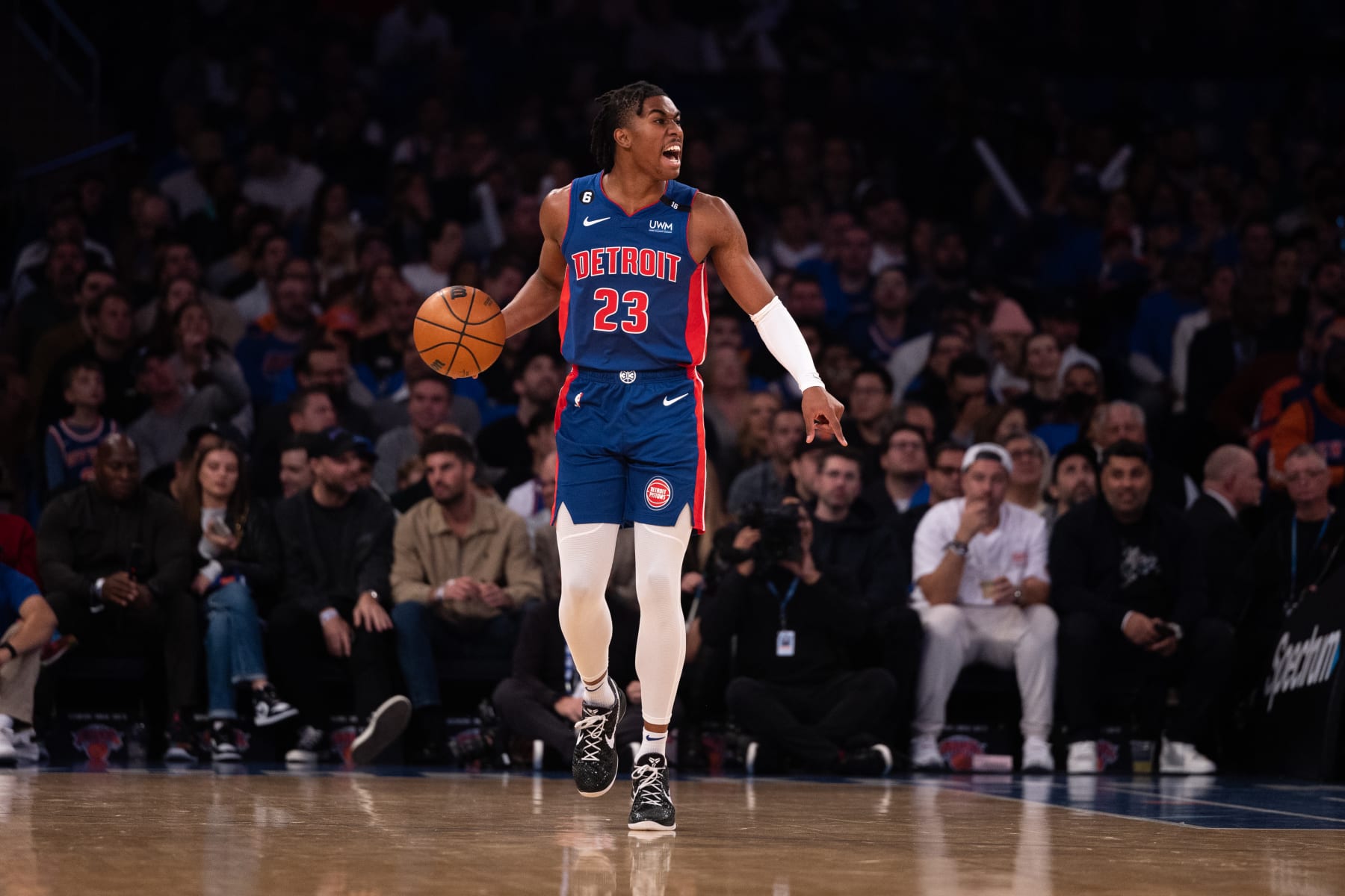 NEW YORK, NEW YORK - OCTOBER 21: Jaden Ivey #23 of the Detroit Pistons brings the ball up the court during the first quarter of the game against the New York Knicks at Madison Square Garden on October 21, 2022 in New York City. NOTE TO USER: User expressly acknowledges and agrees that,  by downloading and or using this photograph,  User is consenting to the terms and conditions of the Getty Images License Agreement. (Photo by Dustin Satloff/Getty Images)