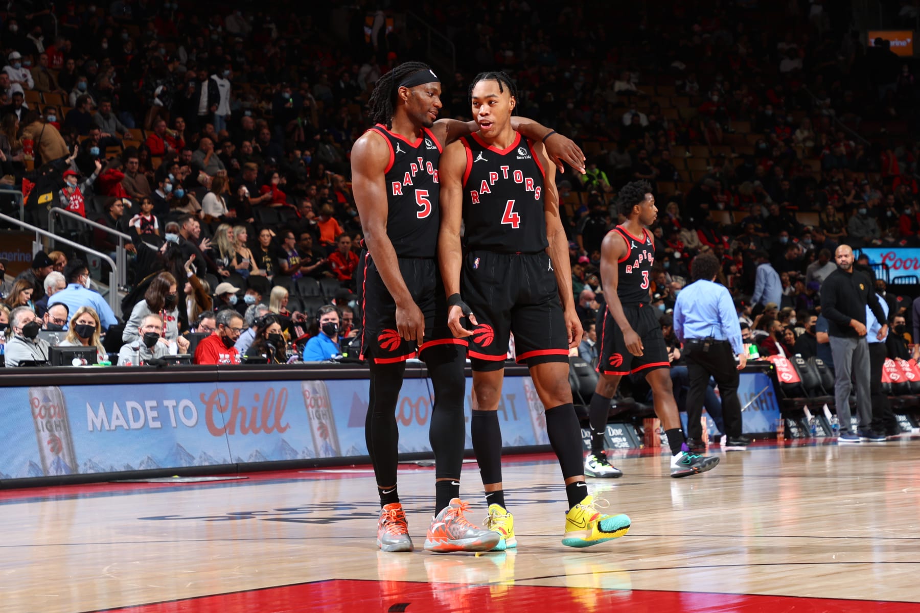 TORONTO, CANADA - NOVEMBER 5: Precious Achiuwa and Scottie Barnes #4 of the Toronto Raptors talk during the game against the Cleveland Cavaliers on November 5, 2021 at the Scotiabank Arena in Toronto, Ontario, Canada.  NOTE TO USER: User expressly acknowledges and agrees that, by downloading and or using this Photograph, user is consenting to the terms and conditions of the Getty Images License Agreement.  Mandatory Copyright Notice: Copyright 2021 NBAE (Photo by Vaughn Ridley/NBAE via Getty Images)