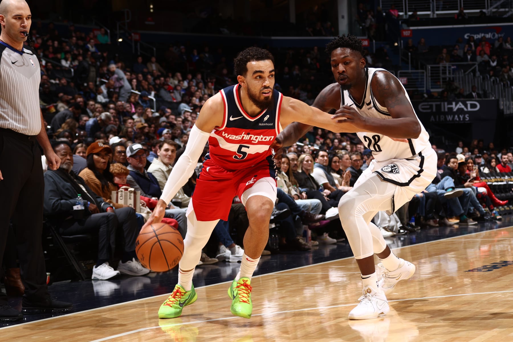WASHINGTON, DC -  DECEMBER 29:  Tyus Jones #5 of the Washington Wizards handles the ball during the game against the Brooklyn Nets on December 29, 2023 at Capital One Arena in Washington, DC. NOTE TO USER: User expressly acknowledges and agrees that, by downloading and or using this Photograph, user is consenting to the terms and conditions of the Getty Images License Agreement. Mandatory Copyright Notice: Copyright 2023 NBAE (Photo by Kenny Giarla/NBAE via Getty Images)