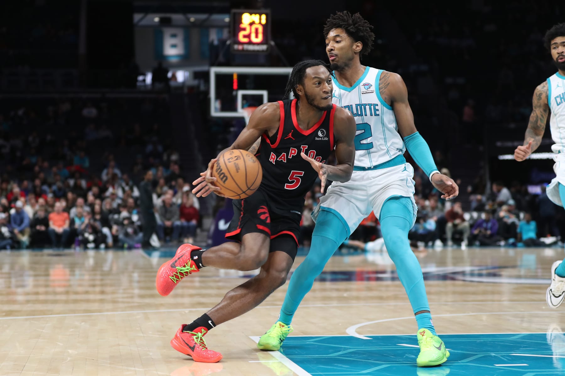 CHARLOTTE, NC - FEBRUARY 7:  Immanuel Quickley #5 of the Toronto Raptors handles the ball during the game against the Charlotte Hornets on February 7, 2024 at Spectrum Center in Charlotte, North Carolina. NOTE TO USER: User expressly acknowledges and agrees that, by downloading and or using this photograph, User is consenting to the terms and conditions of the Getty Images License Agreement.  Mandatory Copyright Notice:  Copyright 2024 NBAE (Photo by Brock Williams-Smith/NBAE via Getty Images)