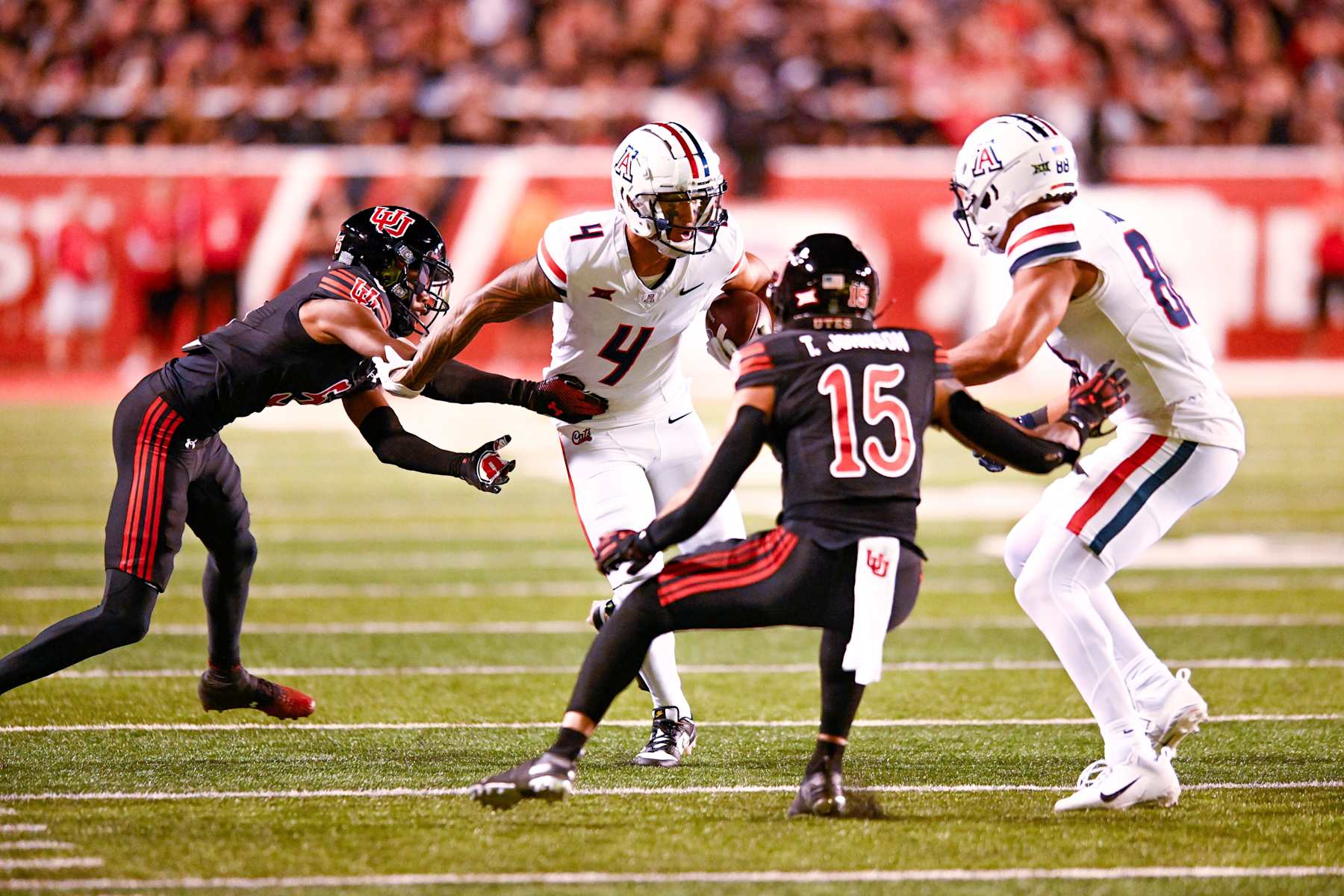 SALT LAKE CITY, UT - SEPTEMBER 28: Arizona Wildcats wide receiver Tetairoa McMillan (4) runs after a catch  during a college football game between the Arizona Wildcats and Utah Utes on September 28, 2024 at Rice Eccles Stadium at Salt Lake City, Utah. (Photo by Boyd Ivey/Icon Sportswire via Getty Images)