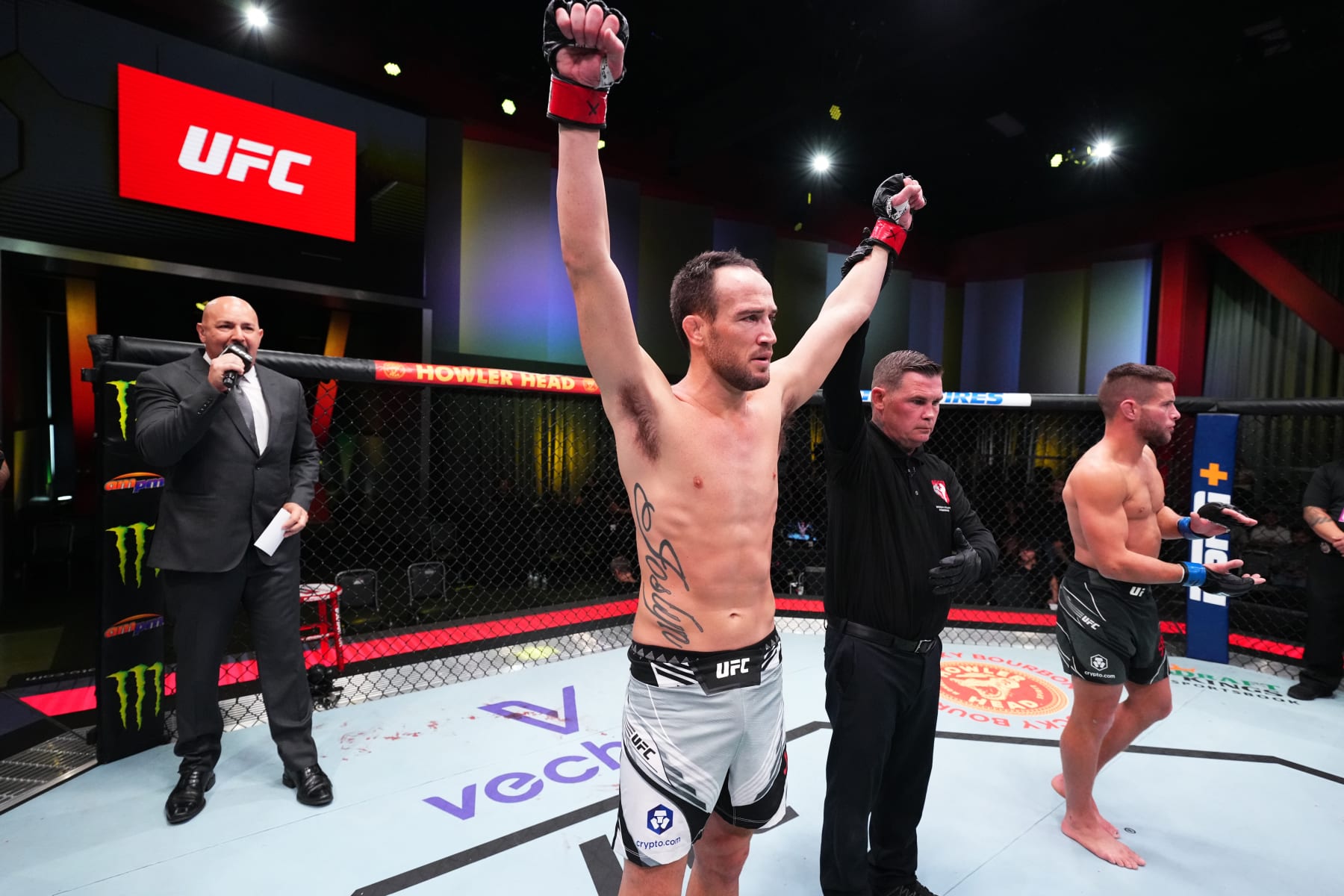 LAS VEGAS, NEVADA - SEPTEMBER 17: (L-R) Damon Jackson reacts after defeating Pat Sabatini in a featherweight fight during the UFC Fight Night event at UFC APEX on September 17, 2022 in Las Vegas, Nevada. (Photo by Chris Unger/Zuffa LLC)