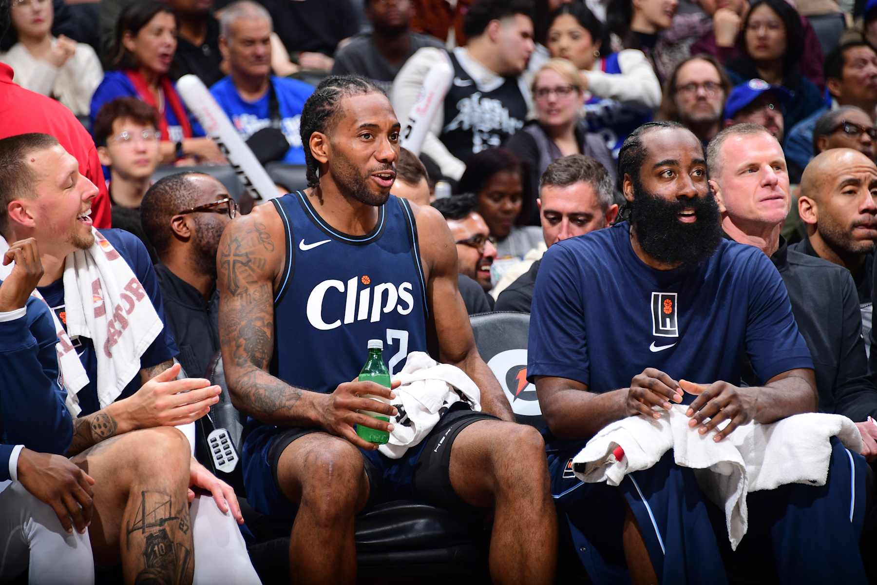 LOS ANGELES, CA - MARCH 1: Kawhi Leonard #2 and James Harden #1 of the LA Clippers looks on during the game against the Washington Wizards on March 1, 2024 at Crypto.Com Arena in Los Angeles, California. NOTE TO USER: User expressly acknowledges and agrees that, by downloading and/or using this Photograph, user is consenting to the terms and conditions of the Getty Images License Agreement. Mandatory Copyright Notice: Copyright 2024 NBAE (Photo by Adam Pantozzi/NBAE via Getty Images)