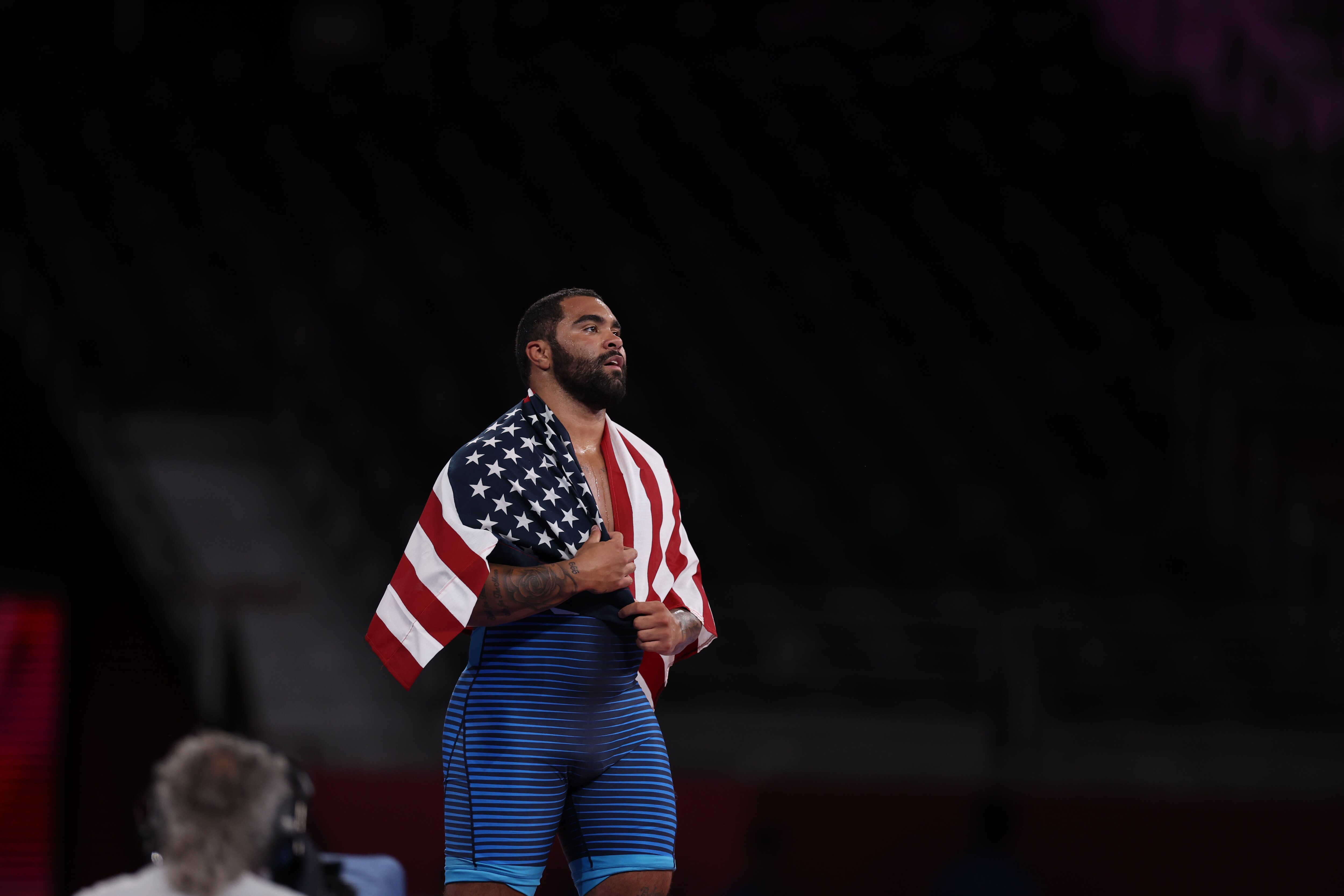 Wrestling: 2020 Summer Olympics: USA Gable Steveson victorious, wearing USA flag after Men's Freestyle 125kg Final at Makuhari Messe Hall. Steveson wins gold. Tokyo, Japan 8/6/2021 CREDIT: Simon Bruty (Photo by Simon Bruty/Sports Illustrated via Getty Images) (Set Number: X163746 TK2)