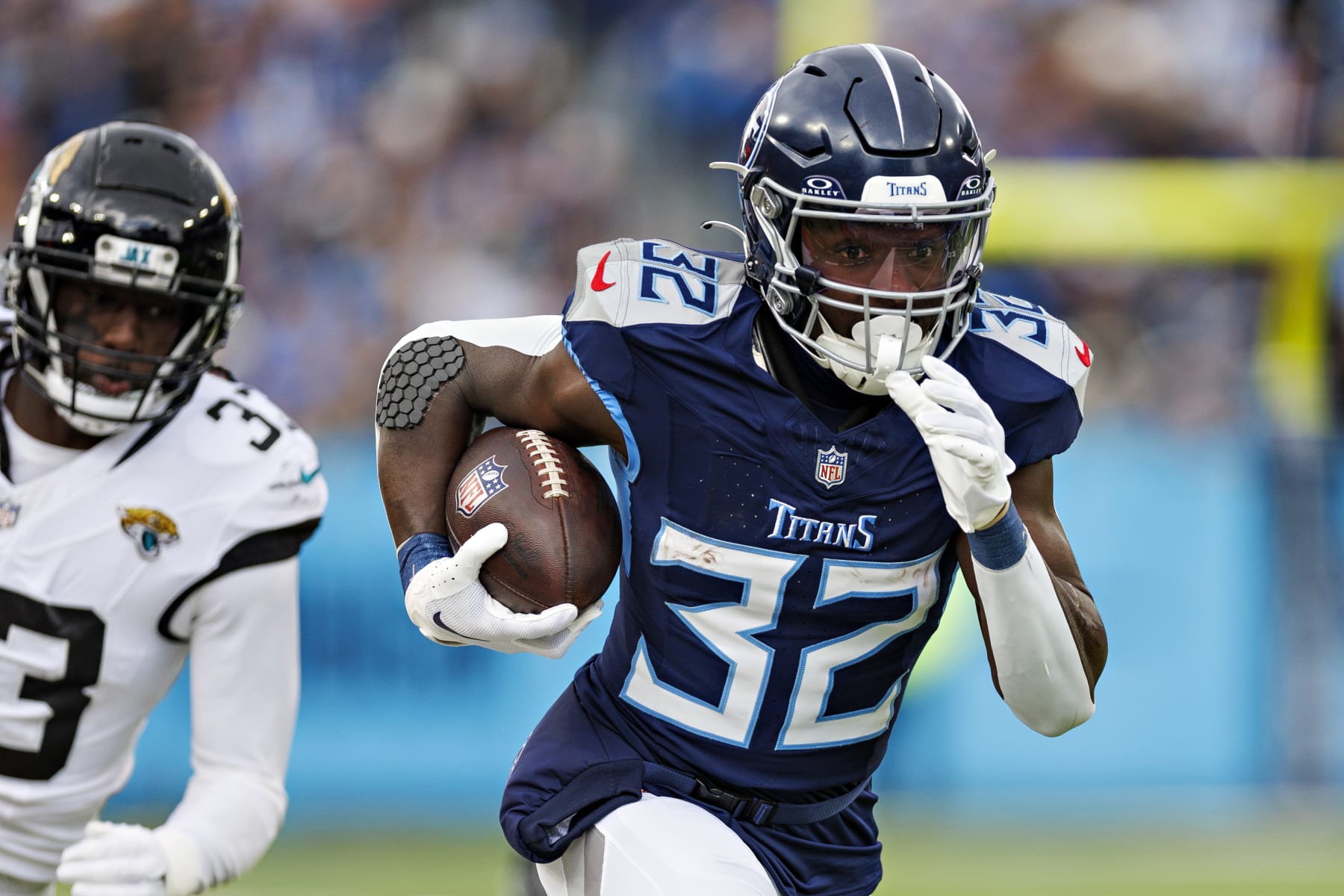 NASHVILLE TENNESSEE - JANUARY 07: Tyjae Spears #32 of the Tennessee Titans runs the ball during the game against the Jacksonville Jaguars in Nashville, Tennessee at Nissan Stadium on January 7, 2024 in Houston, Texas. The Titans defeated the Jaguars 28-20.  (Photo by Wesley Hitt/Getty Images)