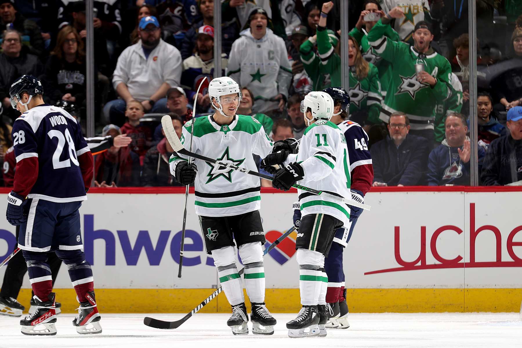 DENVER, COLORADO - FEBRUARY 27: Wyatt Johnston #53 and Logan Stankoven #11 of the Dallas Stars celebrate a goal against the Colorado Avalanche at Ball Arena on February 27, 2024 in Denver, Colorado. (Photo by Michael Martin/NHLI via Getty Images)