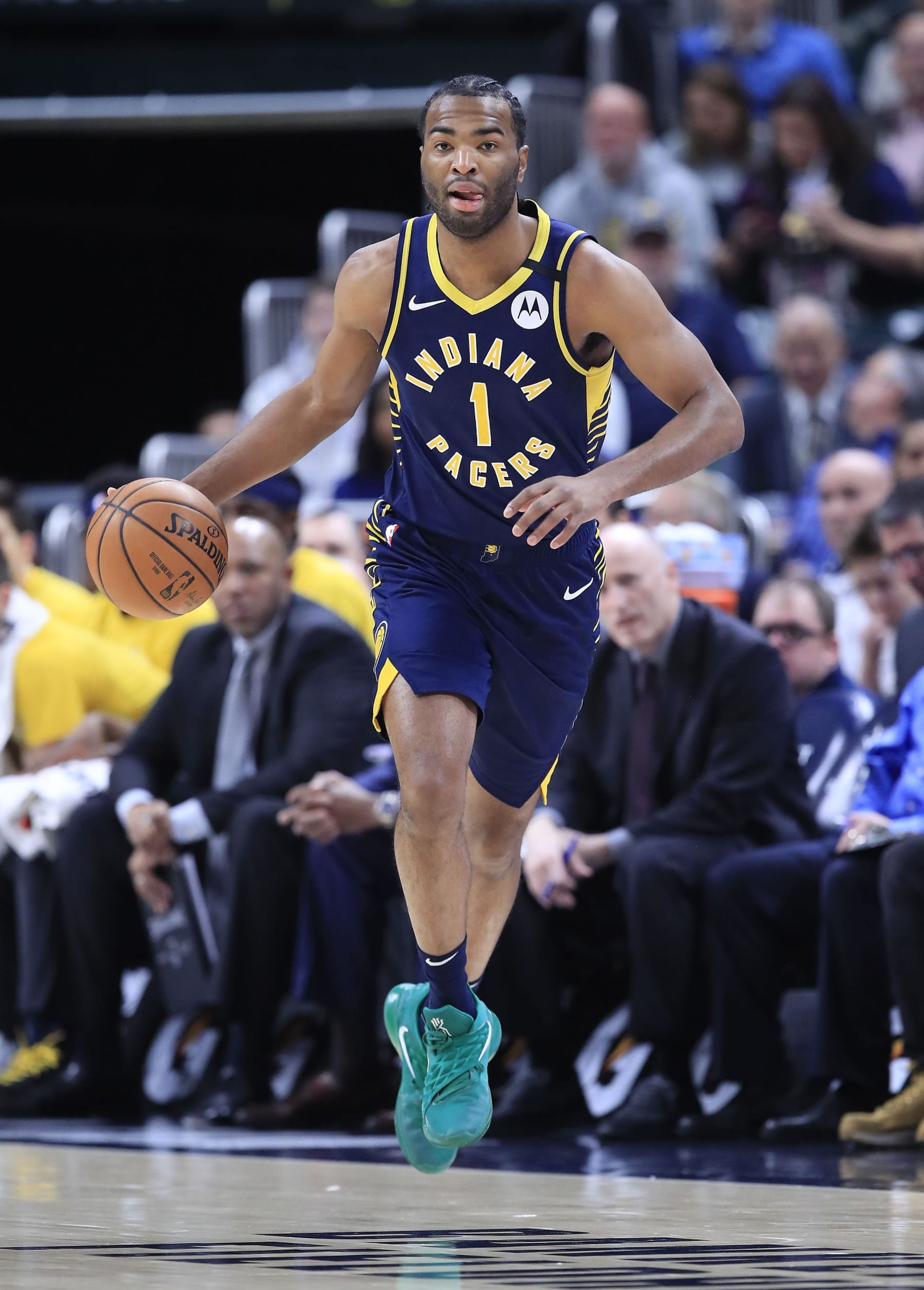 INDIANAPOLIS, INDIANA - FEBRUARY 10:  T.J. Warren #1 of the Indiana Pacers dribbles the ball against the Brooklyn Nets at Bankers Life Fieldhouse on February 10, 2020 in Indianapolis, Indiana.    NOTE TO USER: User expressly acknowledges and agrees that, by downloading and or using this photograph, User is consenting to the terms and conditions of the Getty Images License Agreement. (Photo by Andy Lyons/Getty Images)