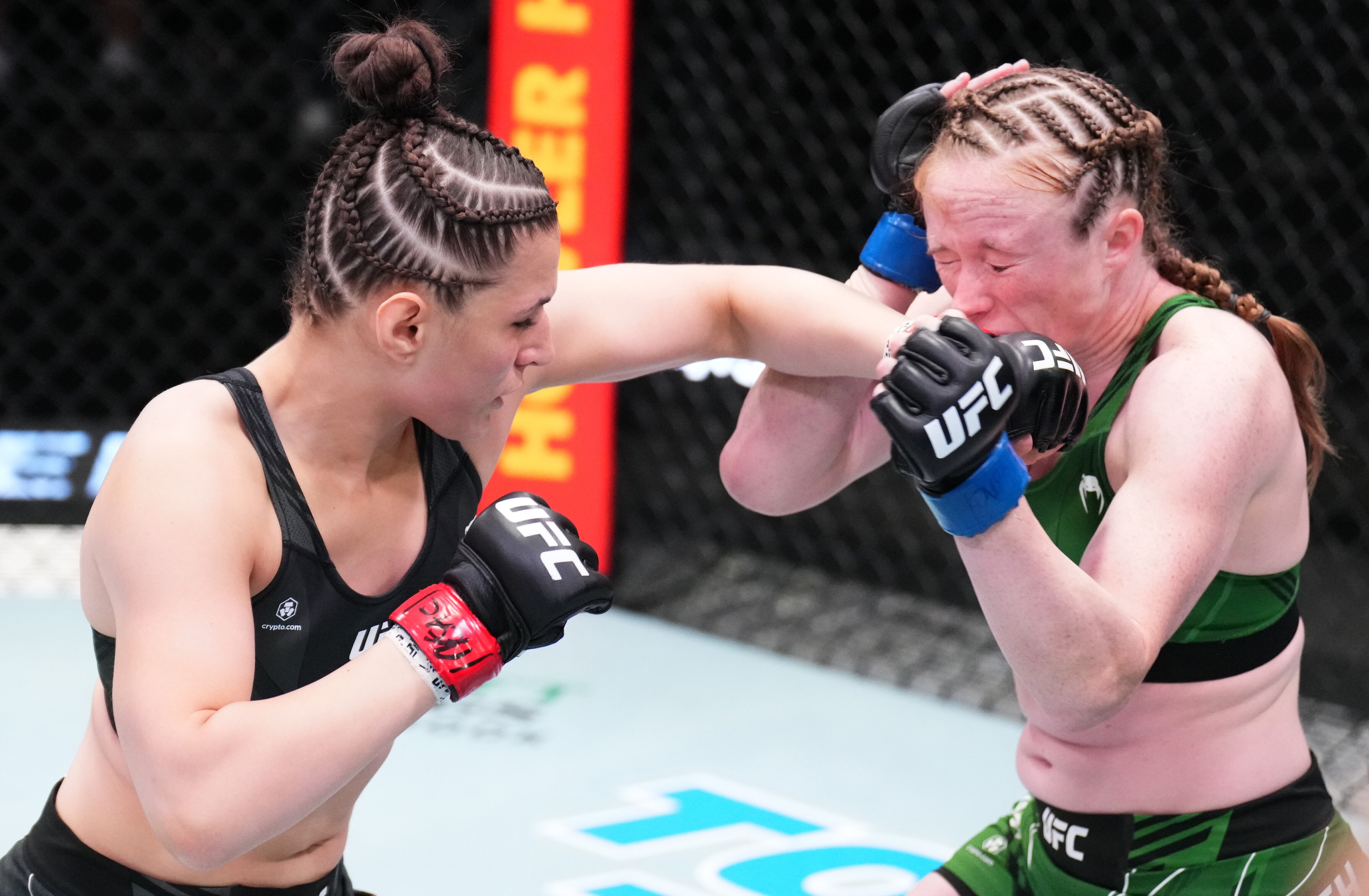 LAS VEGAS, NEVADA - JUNE 04: (L-R) Erin Blanchfield punches JJ Aldrich in a flyweight fight during the UFC Fight Night event at UFC APEX on June 04, 2022 in Las Vegas, Nevada. (Photo by Chris Unger/Zuffa LLC)
