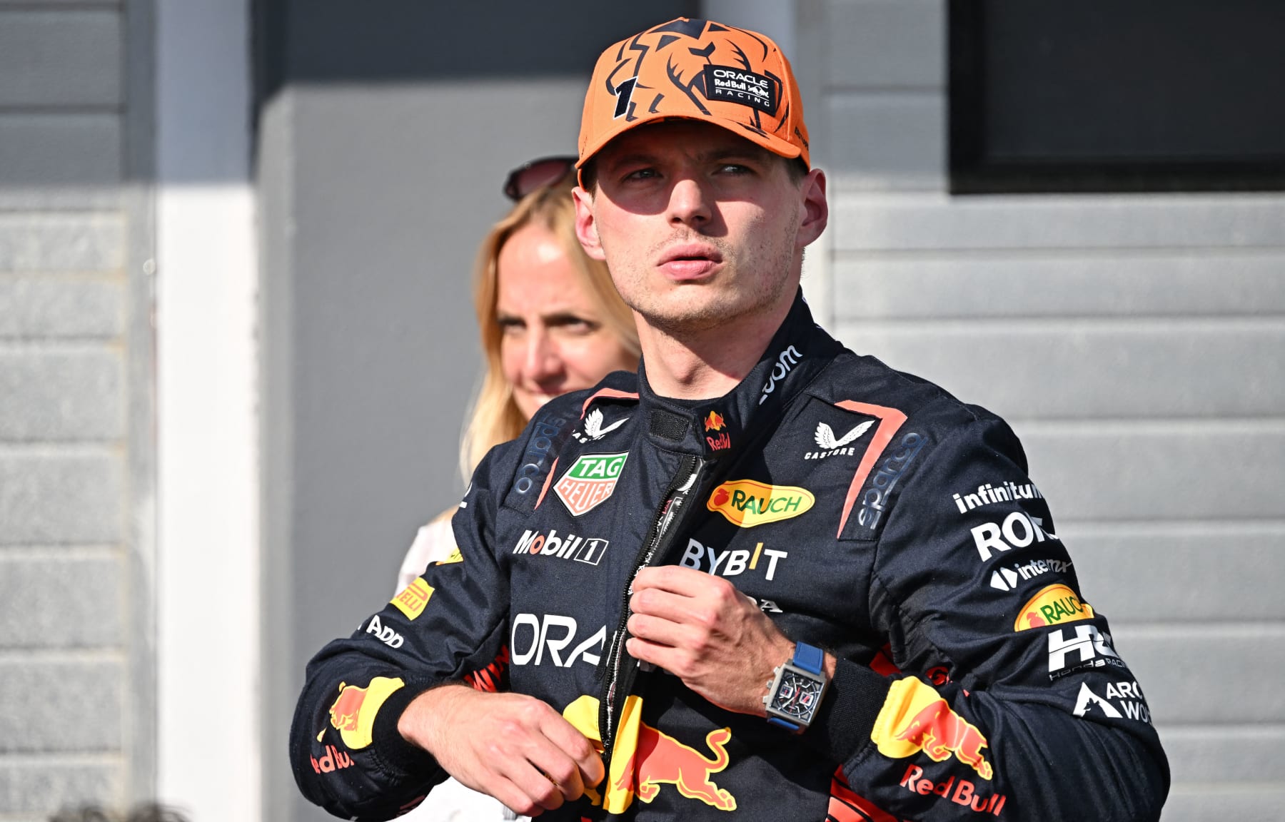 Red Bull Racing's Dutch driver Max Verstappen unzips his overall after the qualifying session at the Hungaroring race track in Mogyorod near Budapest on July 22, 2023, ahead of the Formula One Hungarian Grand Prix. (Photo by ATTILA KISBENEDEK / AFP) (Photo by ATTILA KISBENEDEK/AFP via Getty Images)