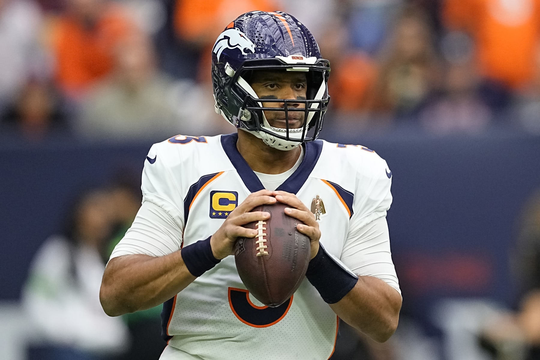 HOUSTON, TEXAS - DECEMBER 03: Russell Wilson #3 of the Denver Broncos looks to pass during the first half against the Houston Texans at NRG Stadium on December 03, 2023 in Houston, Texas. (Photo by Sam Hodde/Getty Images)