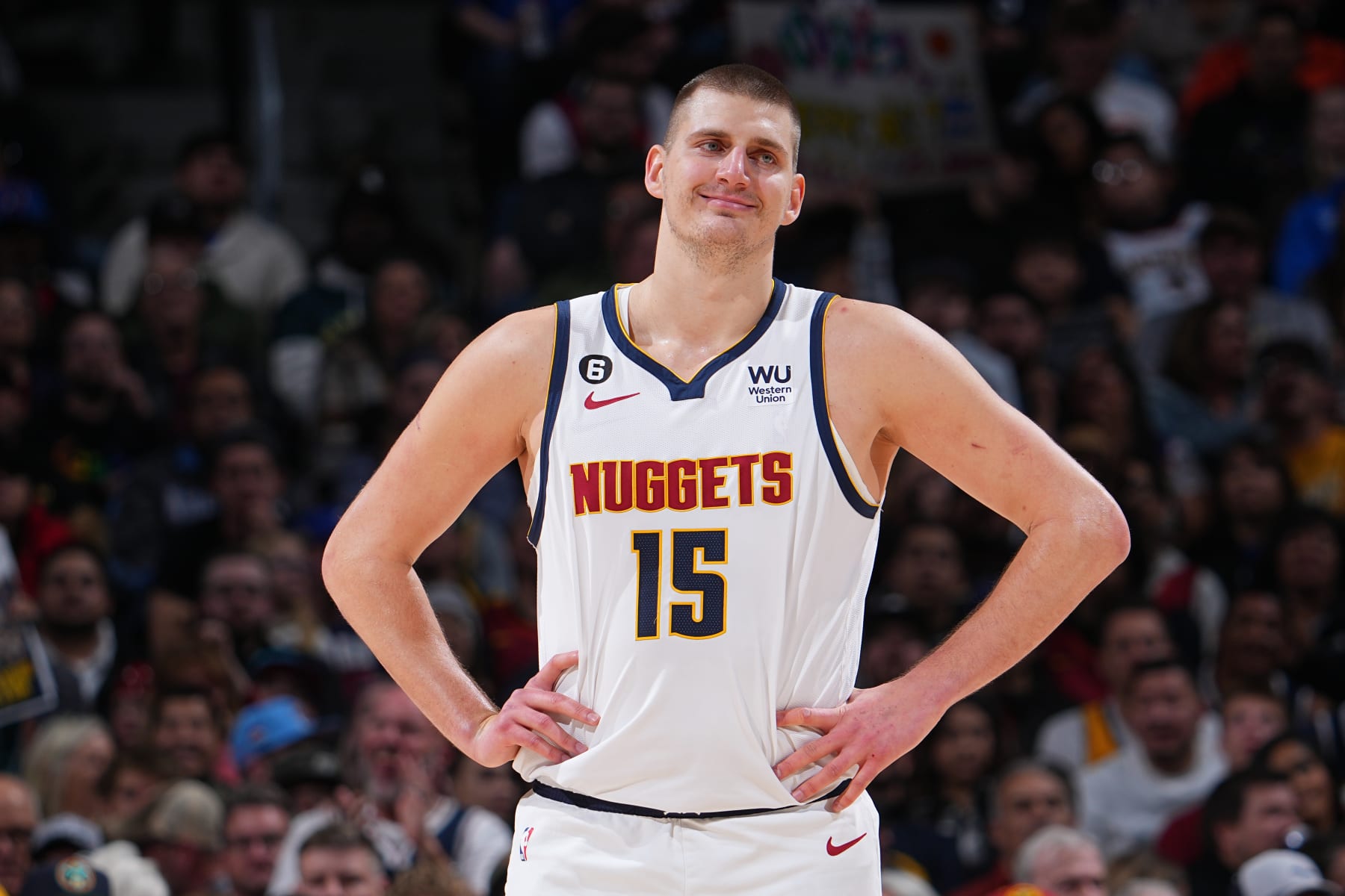 DENVER, CO - DECEMBER 10: Nikola Jokic #15 of the Denver Nuggets smiles during the game against the Utah Jazz on December 10, 2022 at the Ball Arena in Denver, Colorado. NOTE TO USER: User expressly acknowledges and agrees that, by downloading and/or using this Photograph, user is consenting to the terms and conditions of the Getty Images License Agreement. Mandatory Copyright Notice: Copyright 2022 NBAE (Photo by Bart Young/NBAE via Getty Images)
