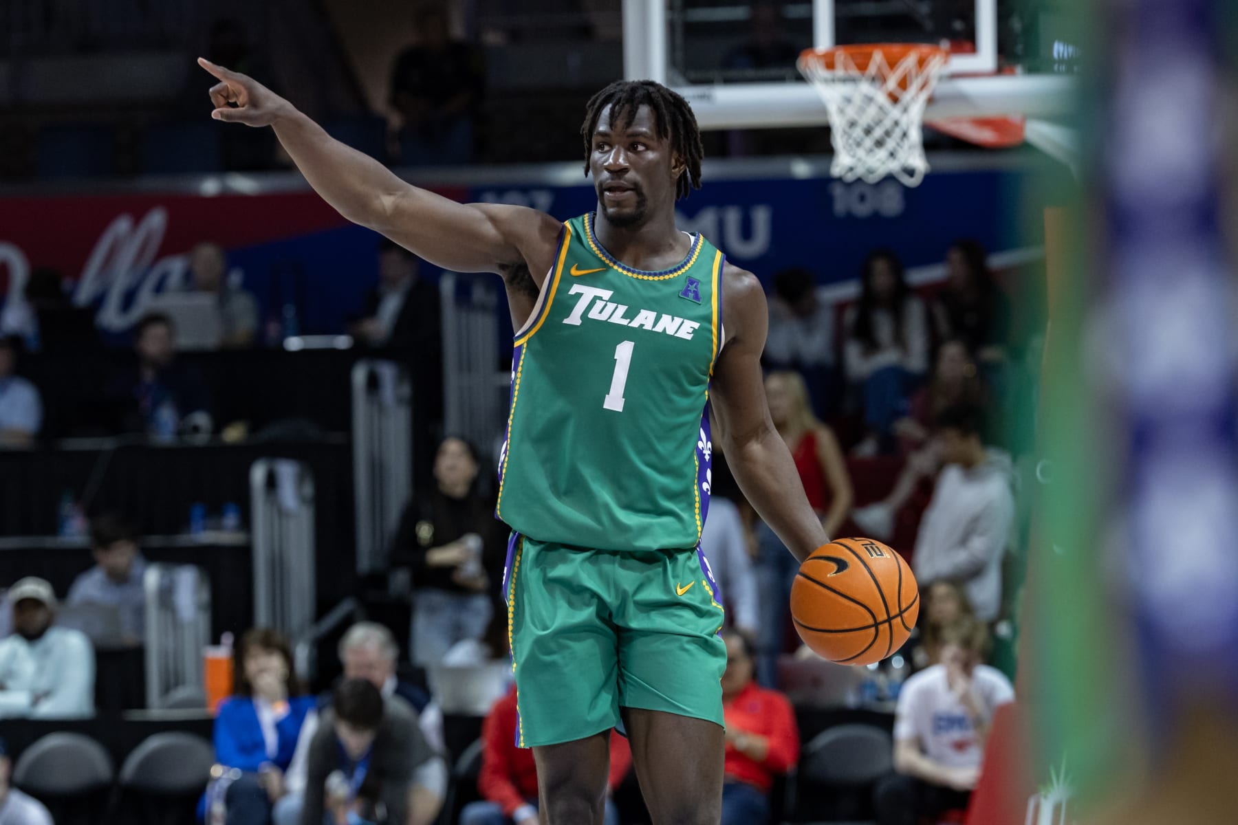DALLAS, TX - FEBRUARY 01: Tulane Green Wave guard Sion James (#1) dribbles up court during the college basketball game between the SMU Mustangs and the Tulane Green Wave on February 1, 2024, at Moody Coliseum in Dallas, TX.  (Photo by Matthew Visinsky/Icon Sportswire via Getty Images)