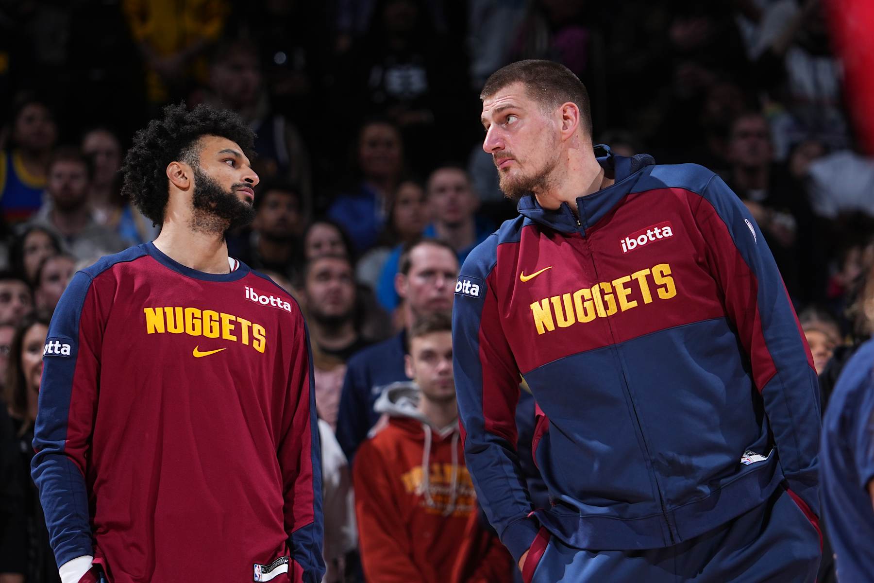 DENVER, CO - DECEMBER 13: Jamal Murray #27 and Nikola Jokic #15 of the Denver Nuggets looks on during the game against the LA Clippers on December 13, 2024 at Ball Arena in Denver, Colorado. NOTE TO USER: User expressly acknowledges and agrees that, by downloading and/or using this Photograph, user is consenting to the terms and conditions of the Getty Images License Agreement. Mandatory Copyright Notice: Copyright 2024 NBAE (Photo by Bart Young/NBAE via Getty Images)