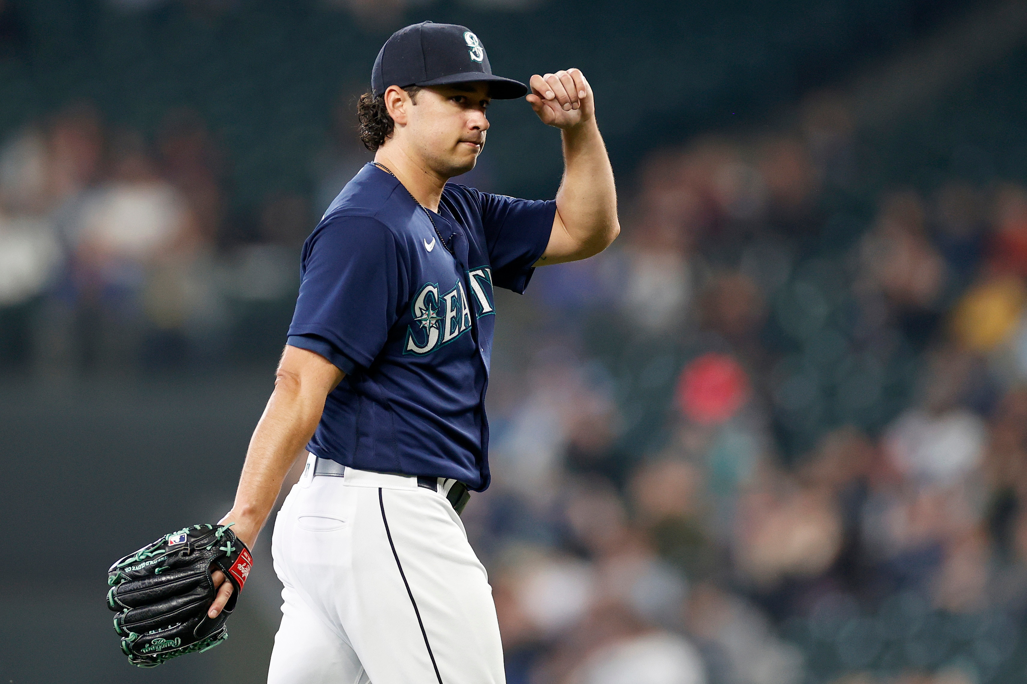 SEATTLE, WASHINGTON - JUNE 15: Marco Gonzales #7 of the Seattle Mariners reacts during the seventh inning against the Minnesota Twins at T-Mobile Park on June 15, 2022 in Seattle, Washington. (Photo by Steph Chambers/Getty Images)