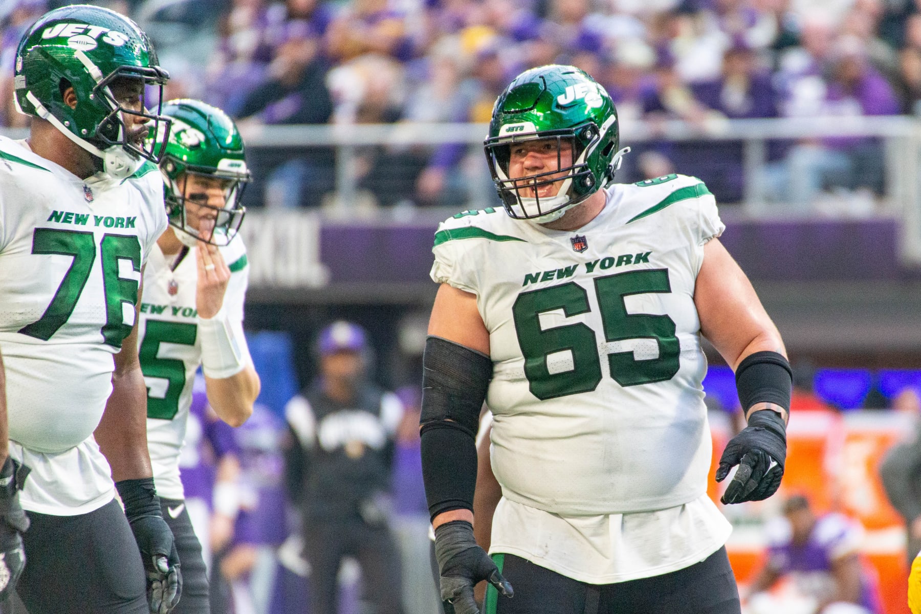 MINNEAPOLIS, MN - DECEMBER 04: New York Jets guard Nate Herbig (65) looks on during the NFL game between the New York Jets and the Minnesota Vikings on December 4th, 2022, at U.S. Bank Stadium, in Minneapolis, MN. (Photo by Bailey Hillesheim/Icon Sportswire via Getty Images)