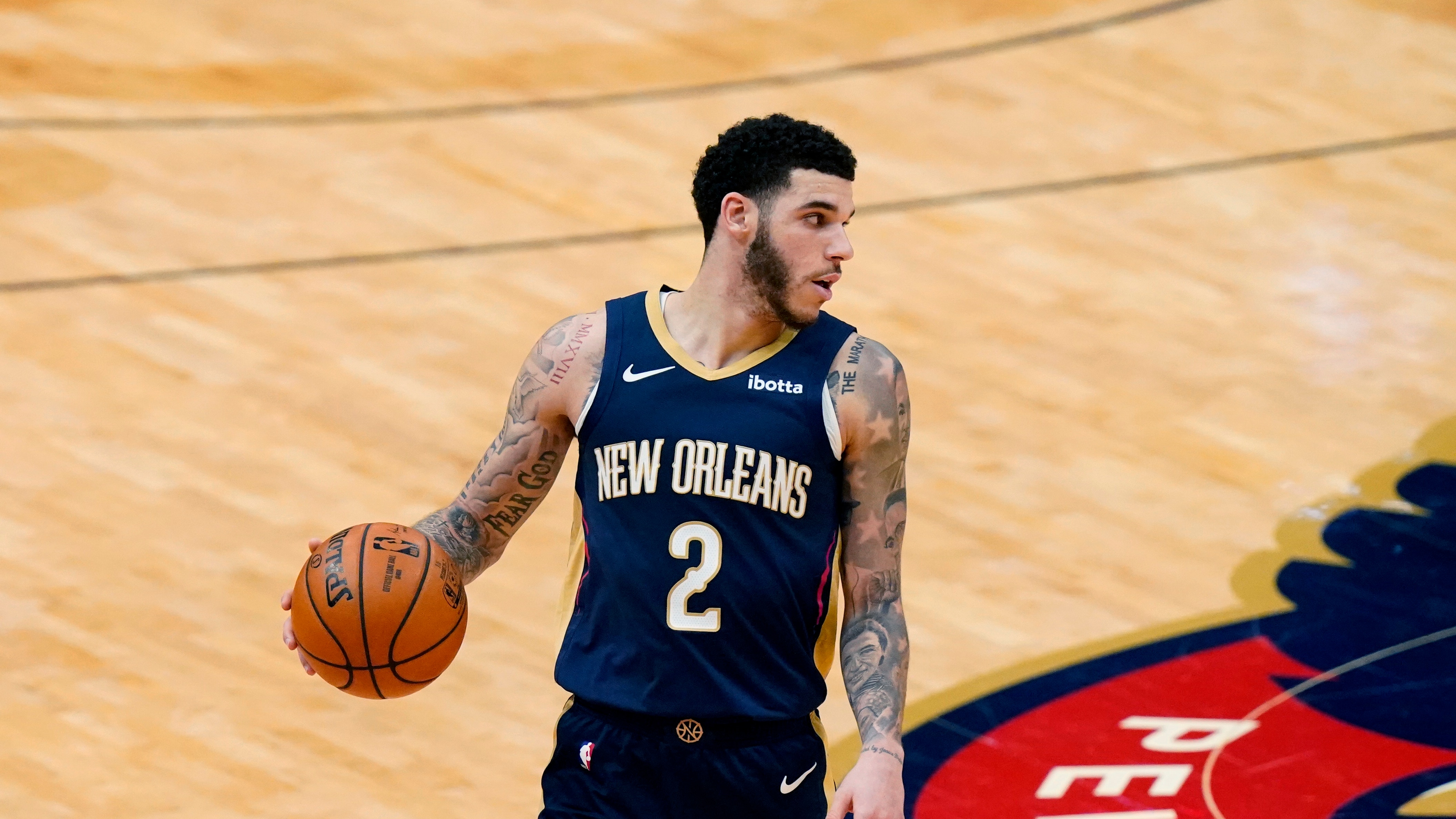 New Orleans Pelicans guard Lonzo Ball (2) moves the ball up court in the second half of an NBA basketball game against the Portland Trail Blazers in New Orleans, Wednesday, Feb. 17, 2021. (AP Photo/Gerald Herbert)