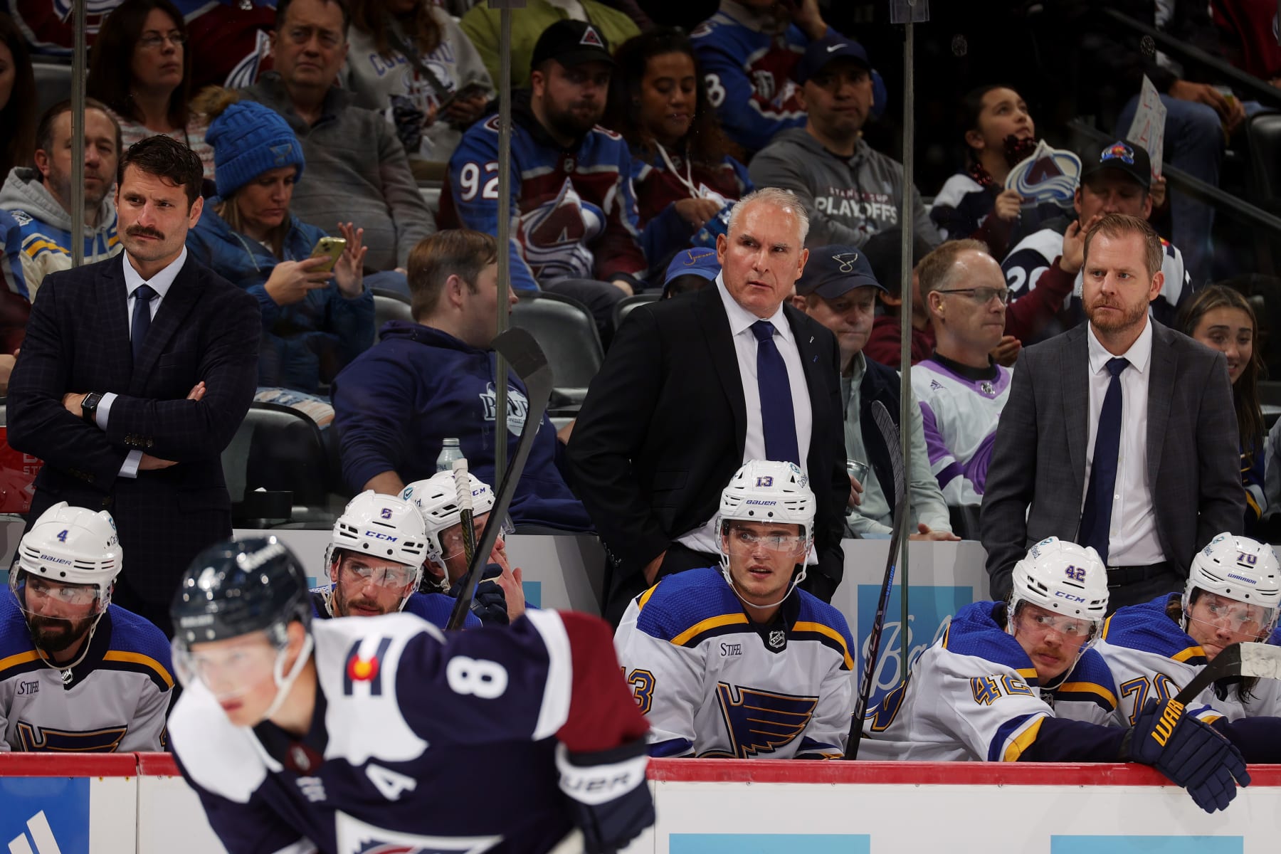DENVER, COLORADO - NOVEMBER 01: Coaching staff of the St. Louis Blues, Mike Weber, Craig Berube and Steve Ott, look on in the third period against the Colorado Avalanche at Ball Arena on November 1, 2023 in Denver, Colorado. (Photo by Michael Martin/NHLI via Getty Images)