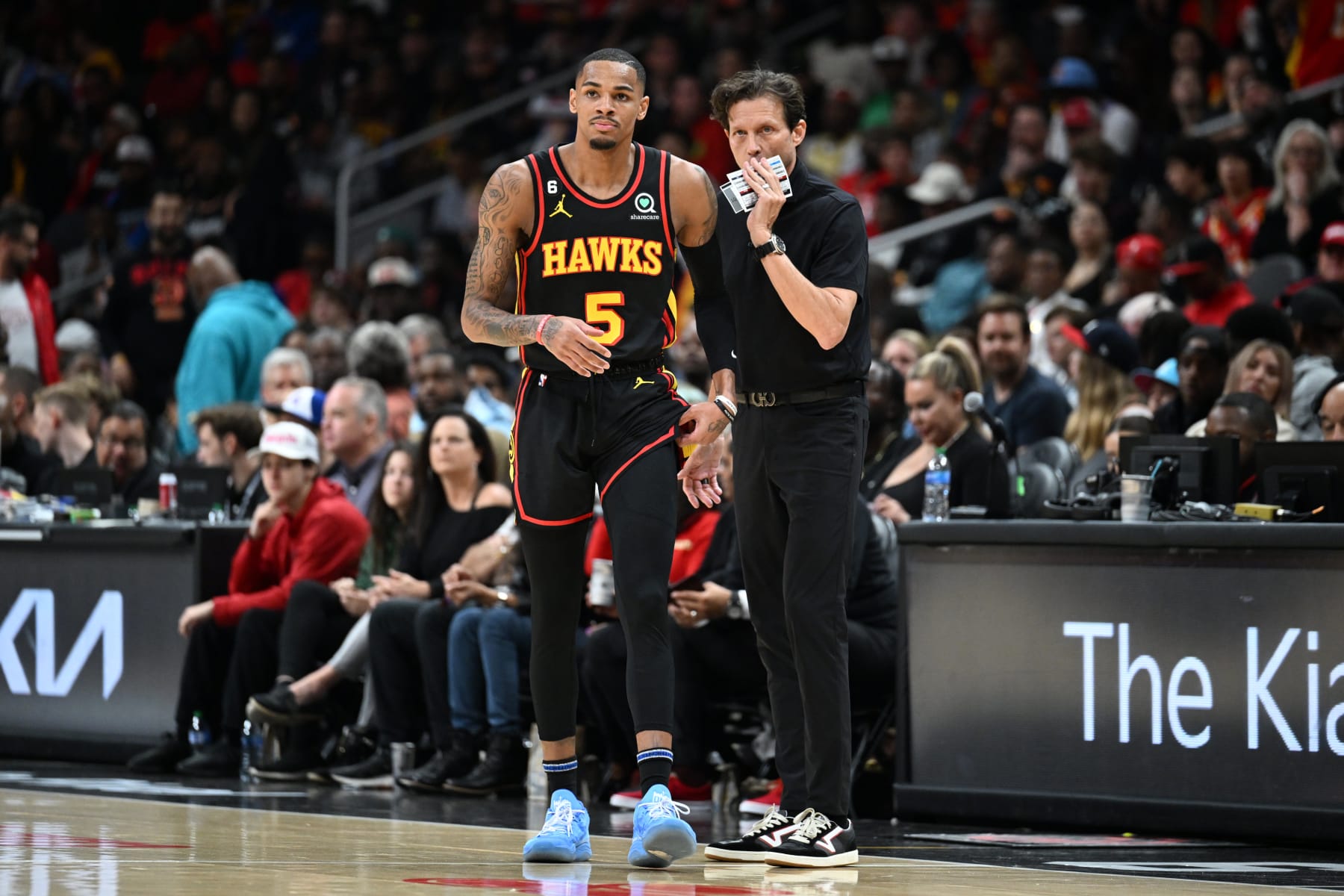 ATLANTA, GA - APRIL 27: Dejounte Murray #5 of the Atlanta Hawks talks with Head Coach Quin Snyder of the Atlanta Hawks during the game against the Boston Celtics during Round 1 Game 6 of the 2023 NBA Playoffs on April 27, 2023 at State Farm Arena in Atlanta, Georgia.  NOTE TO USER: User expressly acknowledges and agrees that, by downloading and/or using this Photograph, user is consenting to the terms and conditions of the Getty Images License Agreement. Mandatory Copyright Notice: Copyright 2023 NBAE (Photo by Adam Hagy/NBAE via Getty Images)