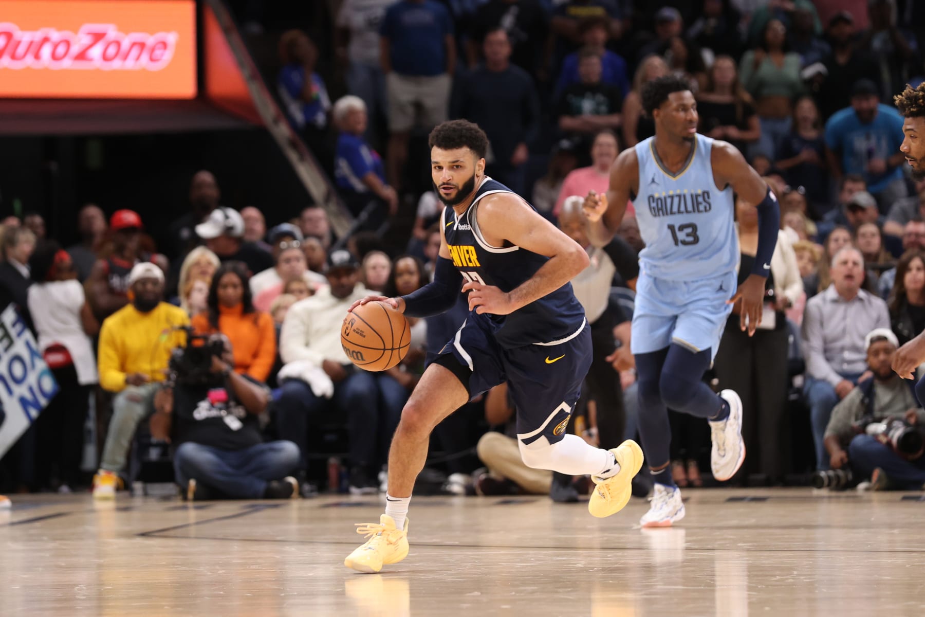 MEMPHIS, TN - OCTOBER 27: Jamal Murray #27 of the Denver Nuggets dribbles the ball during the game against the Memphis Grizzlies on October 27, 2023 at FedExForum in Memphis, Tennessee. NOTE TO USER: User expressly acknowledges and agrees that, by downloading and or using this photograph, User is consenting to the terms and conditions of the Getty Images License Agreement. Mandatory Copyright Notice: Copyright 2023 NBAE (Photo by Joe Murphy/NBAE via Getty Images)