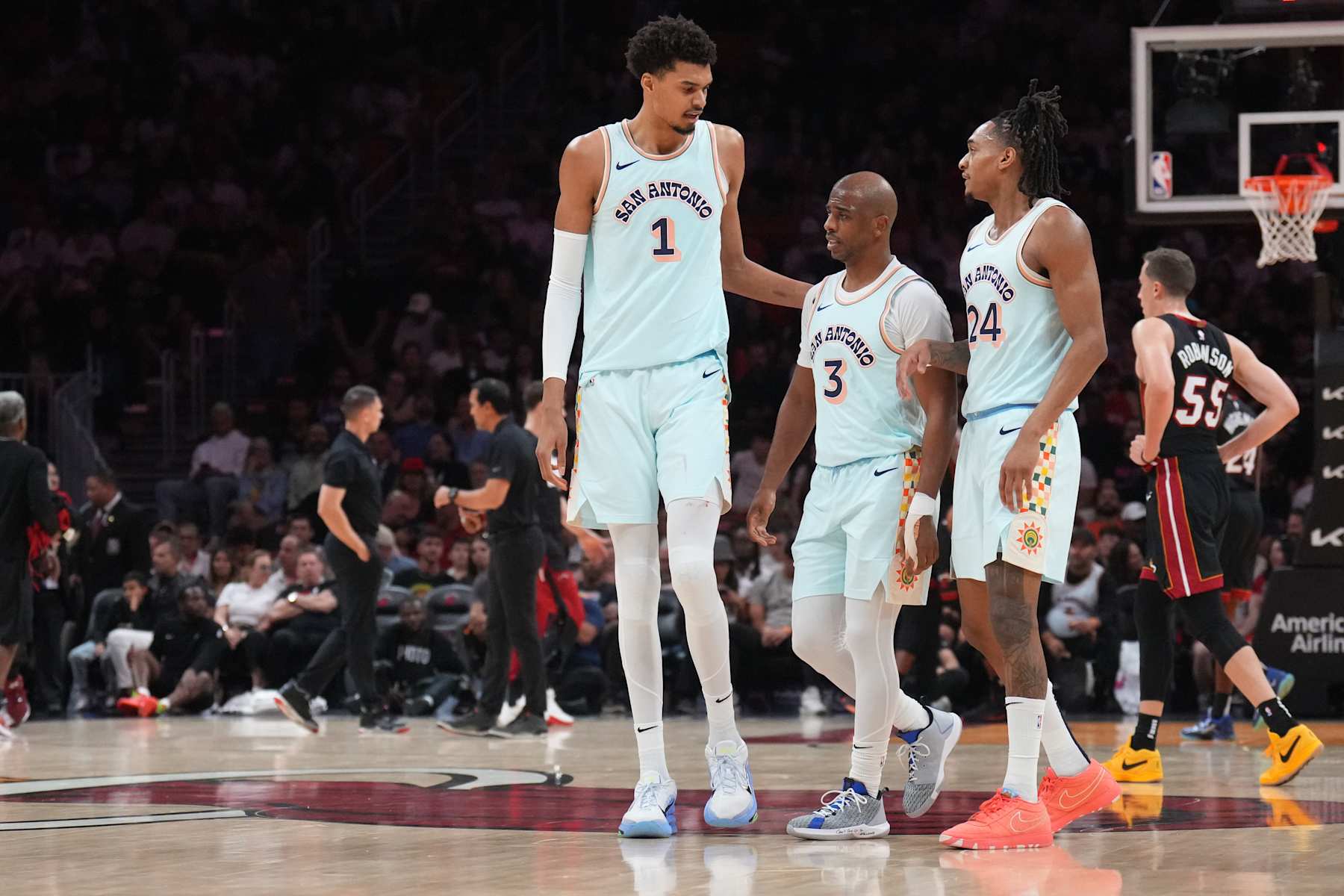 MIAMI, FL - JANUARY 19: Victor Wembanyama #1 and Chris Paul #3 of the San Antonio Spurs look on during the game against the Miami Heat on January 19, 2025 at Kaseya Center in Miami, Florida. NOTE TO USER: User expressly acknowledges and agrees that, by downloading and or using this Photograph, user is consenting to the terms and conditions of the Getty Images License Agreement. Mandatory Copyright Notice: Copyright 2025 NBAE (Photo by Jesse D. Garrabrant/NBAE via Getty Images)