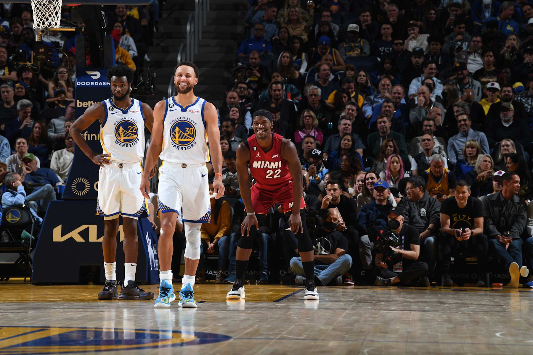 SAN FRANCISCO, CA - OCTOBER 27: Stephen Curry #30 of the Golden State Warriors and Jimmy Butler #22 of the Miami Heat laugh on the court during the game on October 27, 2022 at Chase Center in San Francisco, California. NOTE TO USER: User expressly acknowledges and agrees that, by downloading and or using this photograph, user is consenting to the terms and conditions of Getty Images License Agreement. Mandatory Copyright Notice: Copyright 2022 NBAE (Photo by Noah Graham/NBAE via Getty Images)