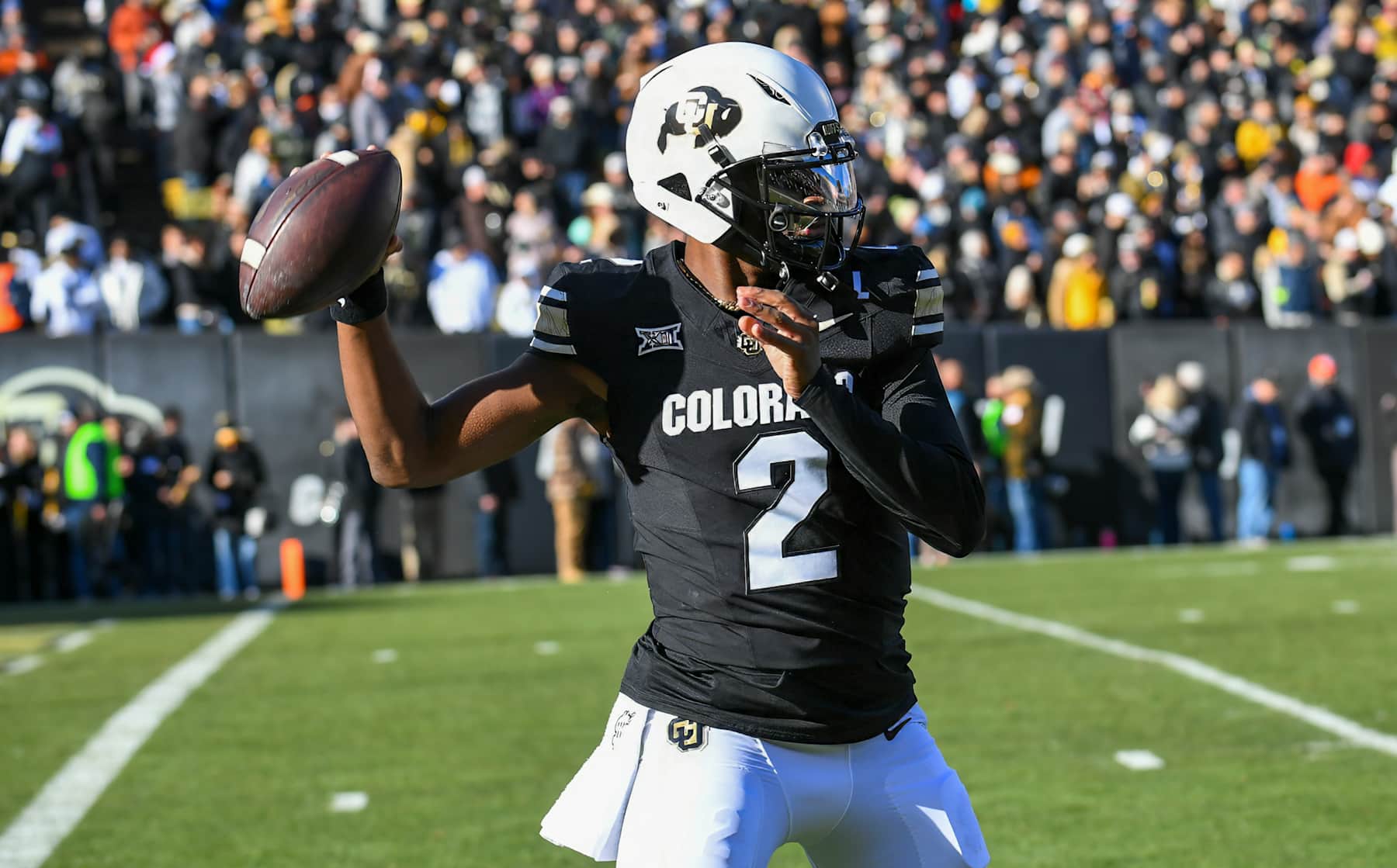 BOULDER, CO - NOVEMBER 29: Colorado quarterback Shedeur Sanders (2) looks for a receiver during the college football game between the Oklahoma State University Cowboys and the University of Colorado Buffaloes on November 29, 2024 at Folsom Field in Boulder, CO. (Photo by Kevin Langley/Icon Sportswire via Getty Images)
