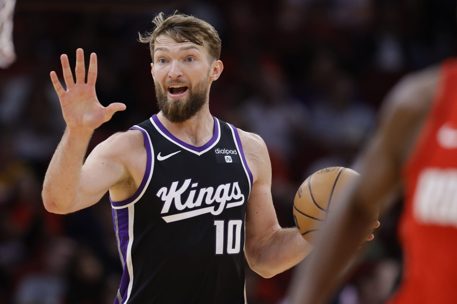 HOUSTON, TEXAS - NOVEMBER 06: Domantas Sabonis #10 of the Sacramento Kings calls a play against the Houston Rockets during the first half at Toyota Center on November 06, 2023 in Houston, Texas. (Photo by Carmen Mandato/Getty Images)