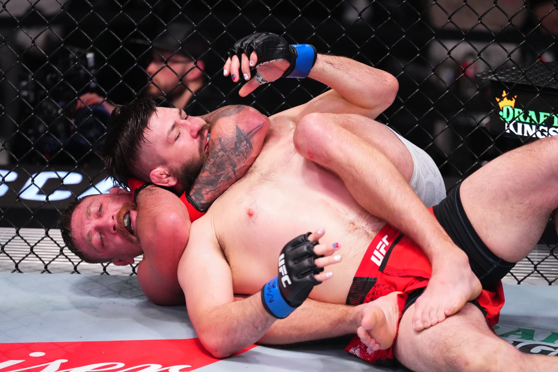 LAS VEGAS, NEVADA - MARCH 16: (L-R) Gerald Meerschaert attempts to submit in their middleweight fight during the UFC Fight Night event at UFC APEX on March 16, 2024 in Las Vegas, Nevada. (Photo by Jeff Bottari/Zuffa LLC via Getty Images)