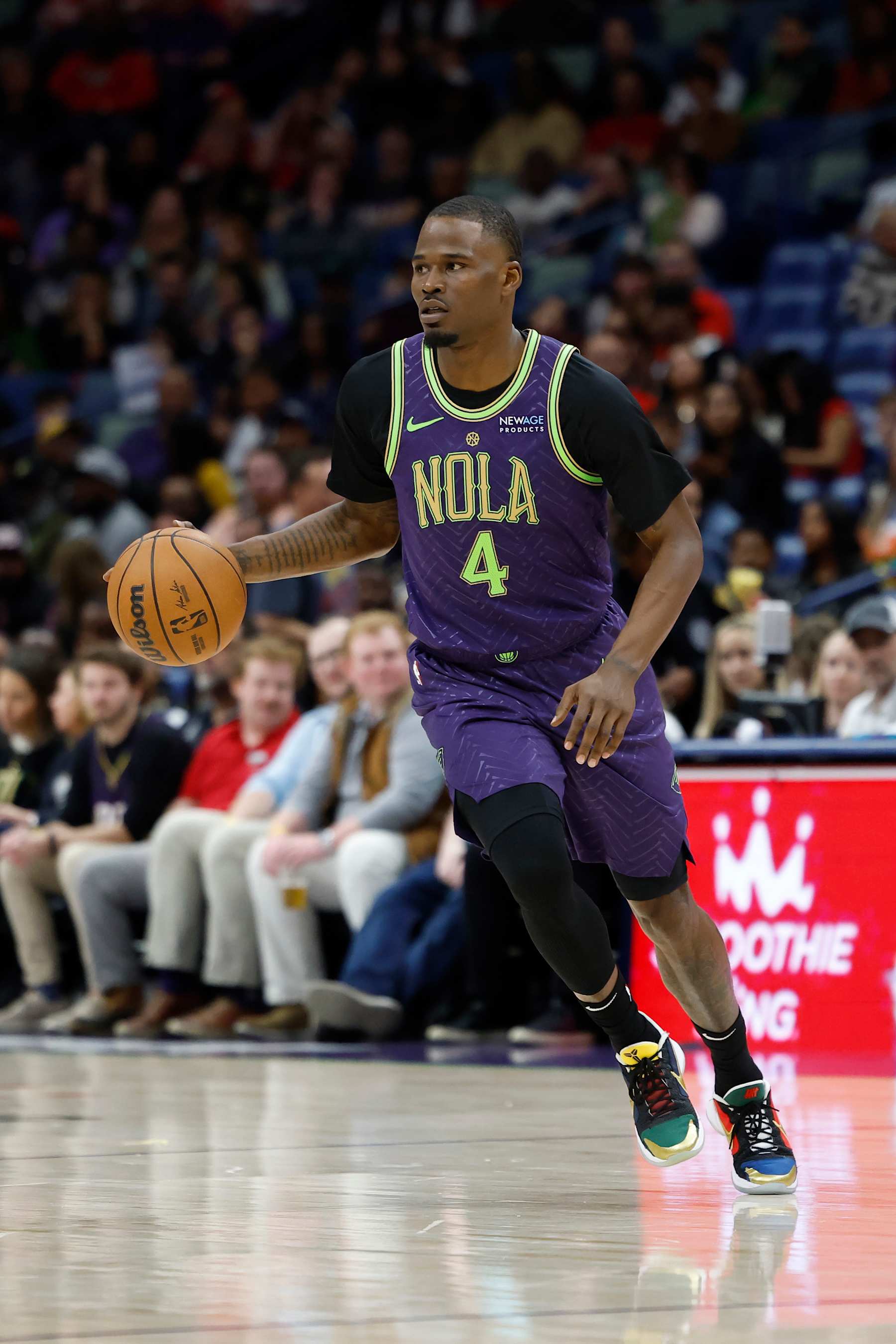 NEW ORLEANS, LOUISIANA - DECEMBER 30: Javonte Green #4 of the New Orleans Pelicans drives to the basket during the first half of a game against the LA Clippers at Smoothie King Center on December 30, 2024 in New Orleans, Louisiana. NOTE TO USER: User expressly acknowledges and agrees that, by downloading and or using this photograph, User is consenting to the terms and conditions of the Getty Images License Agreement. (Photo by Tyler Kaufman/Getty Images)