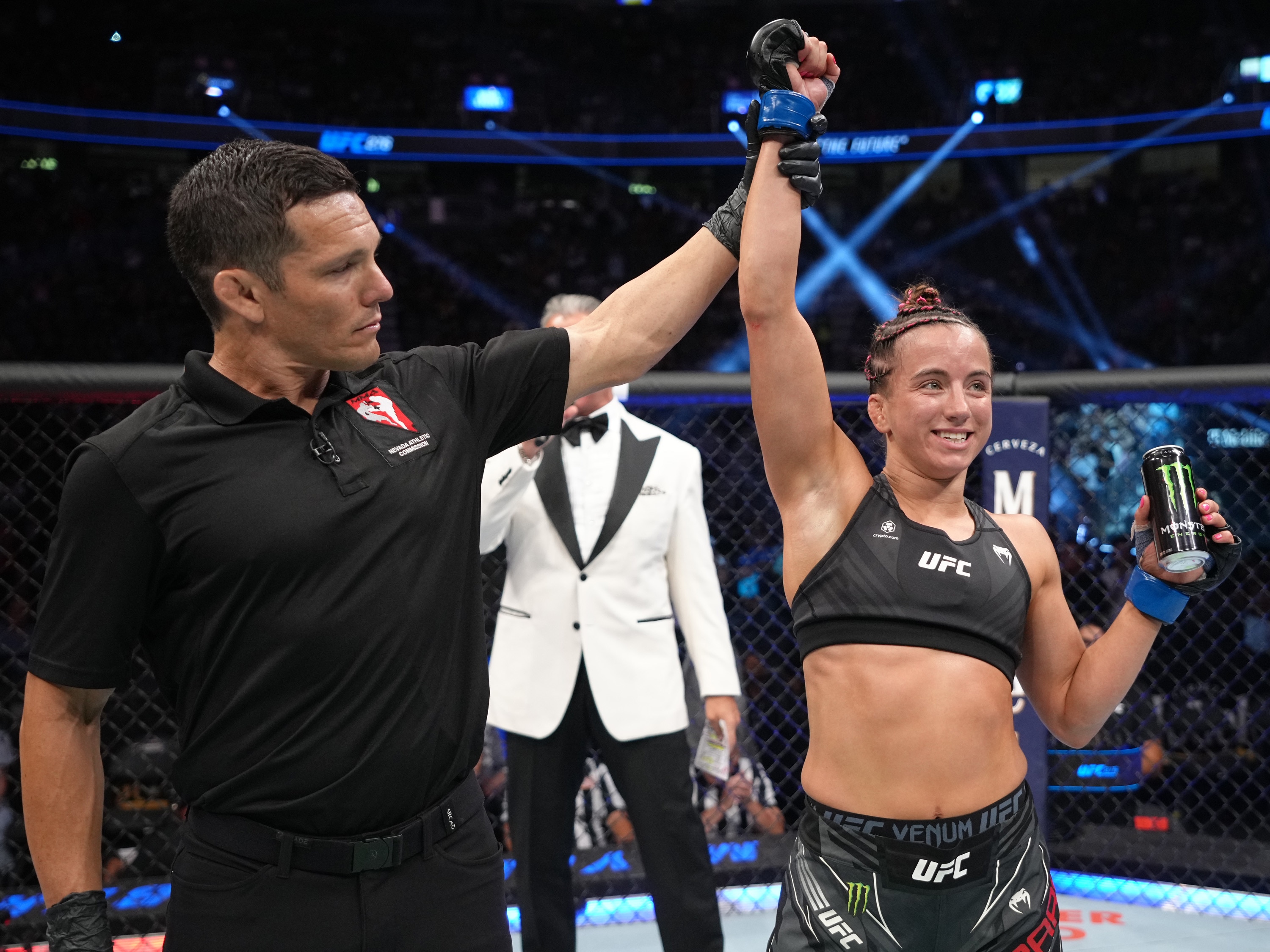 LAS VEGAS, NEVADA - JULY 02: Maycee Barber has her hand raised in victory over Jessica Eye in a flyweight fight during the UFC 276 event at T-Mobile Arena on July 02, 2022 in Las Vegas, Nevada. (Photo by Jeff Bottari/Zuffa LLC)
