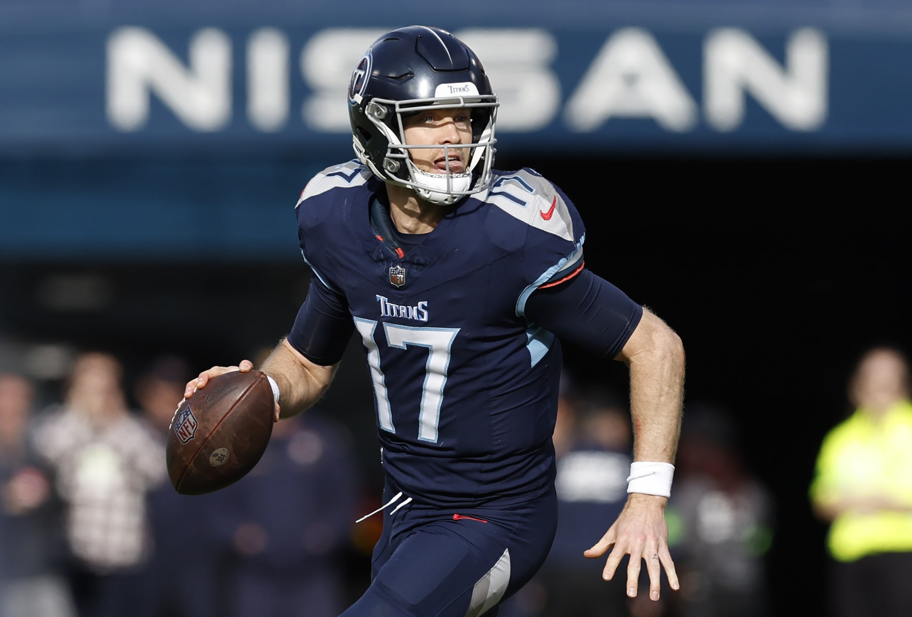 NASHVILLE, TENNESSEE - DECEMBER 24: Ryan Tannehill #17 of the Tennessee Titans scrambles during the first half in the game against the Seattle Seahawks at Nissan Stadium on December 24, 2023 in Nashville, Tennessee. (Photo by Wesley Hitt/Getty Images)