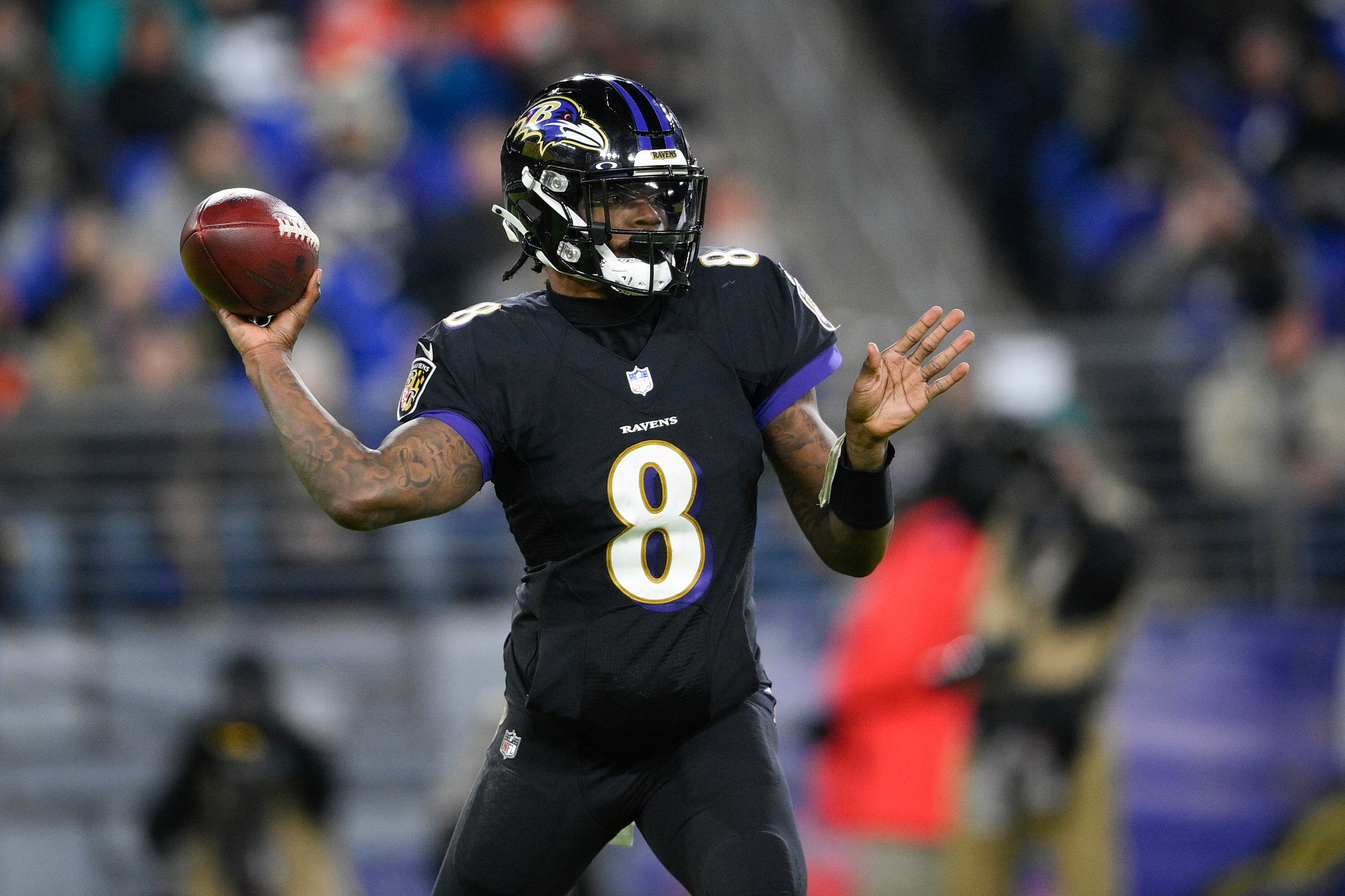 Baltimore Ravens quarterback Lamar Jackson throws a pass against the Cleveland Browns during the second half of an NFL football game, Sunday, Nov. 28, 2021, in Baltimore. (AP Photo/Nick Wass)