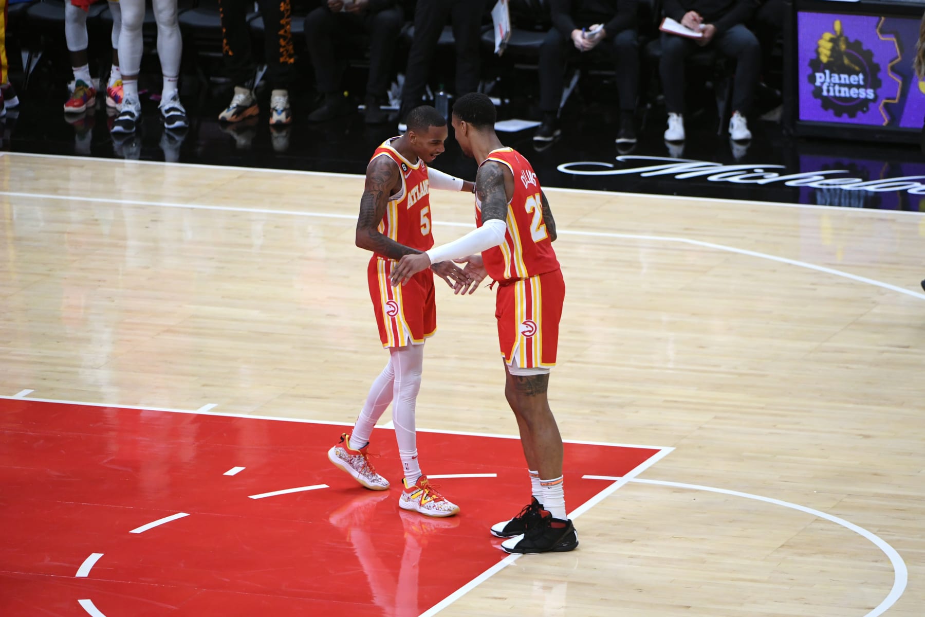 ATLANTA, GA - OCTOBER 19: Dejounte Murray #5 talks to John Collins #20 of the Atlanta Hawks during the game against the Houston Rockets on October 19, 2022 at State Farm Arena in Atlanta, Georgia.  NOTE TO USER: User expressly acknowledges and agrees that, by downloading and/or using this Photograph, user is consenting to the terms and conditions of the Getty Images License Agreement. Mandatory Copyright Notice: Copyright 2022 NBAE (Photo by Scott Cunningham/NBAE via Getty Images)