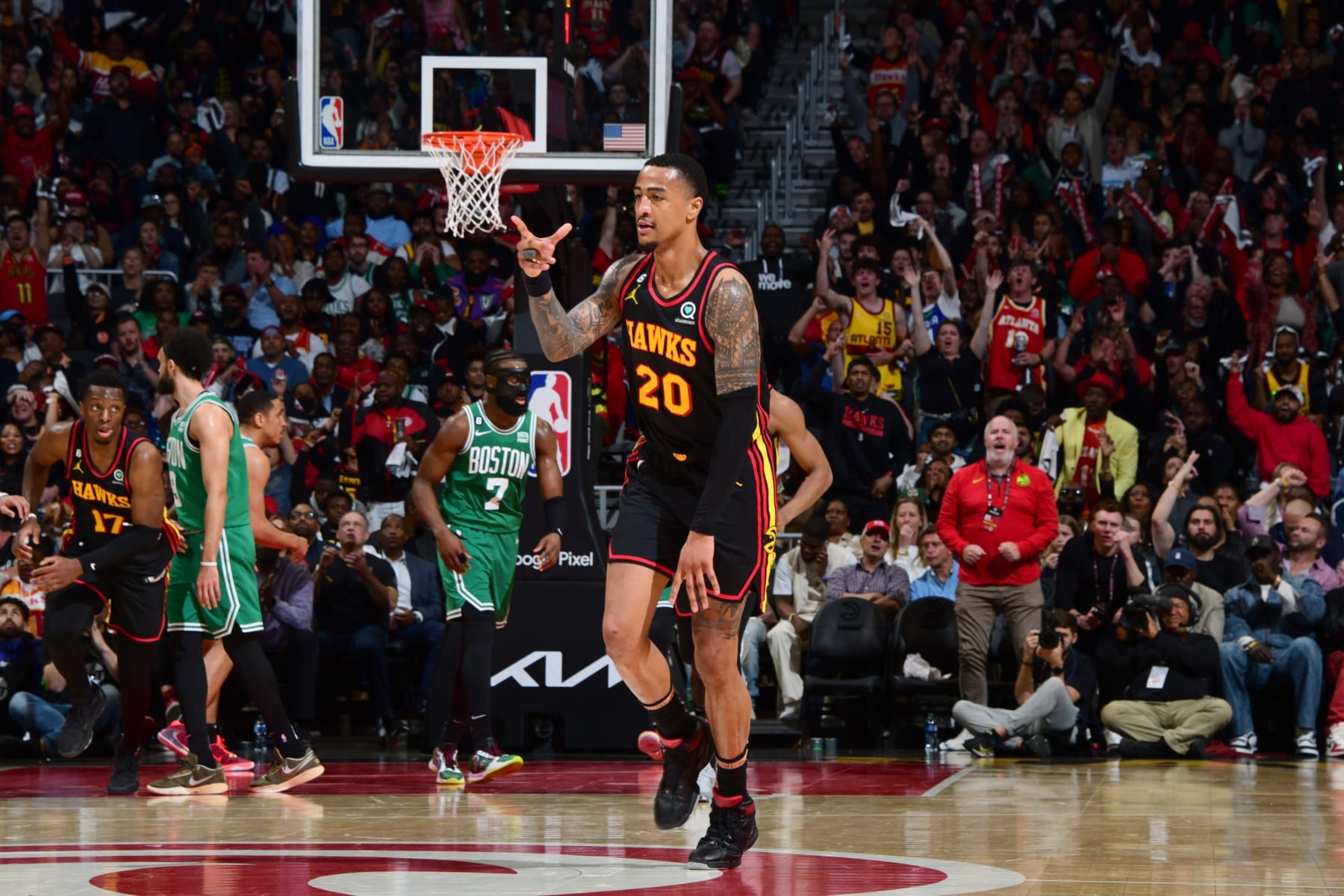 ATLANTA, GA - APRIL 27: John Collins #20 of the Atlanta Hawks celebrates during Round One Game Six of the 2023 NBA Playoffs on April 27, 2023 at State Farm Arena in Atlanta, Georgia.  NOTE TO USER: User expressly acknowledges and agrees that, by downloading and/or using this Photograph, user is consenting to the terms and conditions of the Getty Images License Agreement. Mandatory Copyright Notice: Copyright 2023 NBAE (Photo by Scott Cunningham/NBAE via Getty Images)