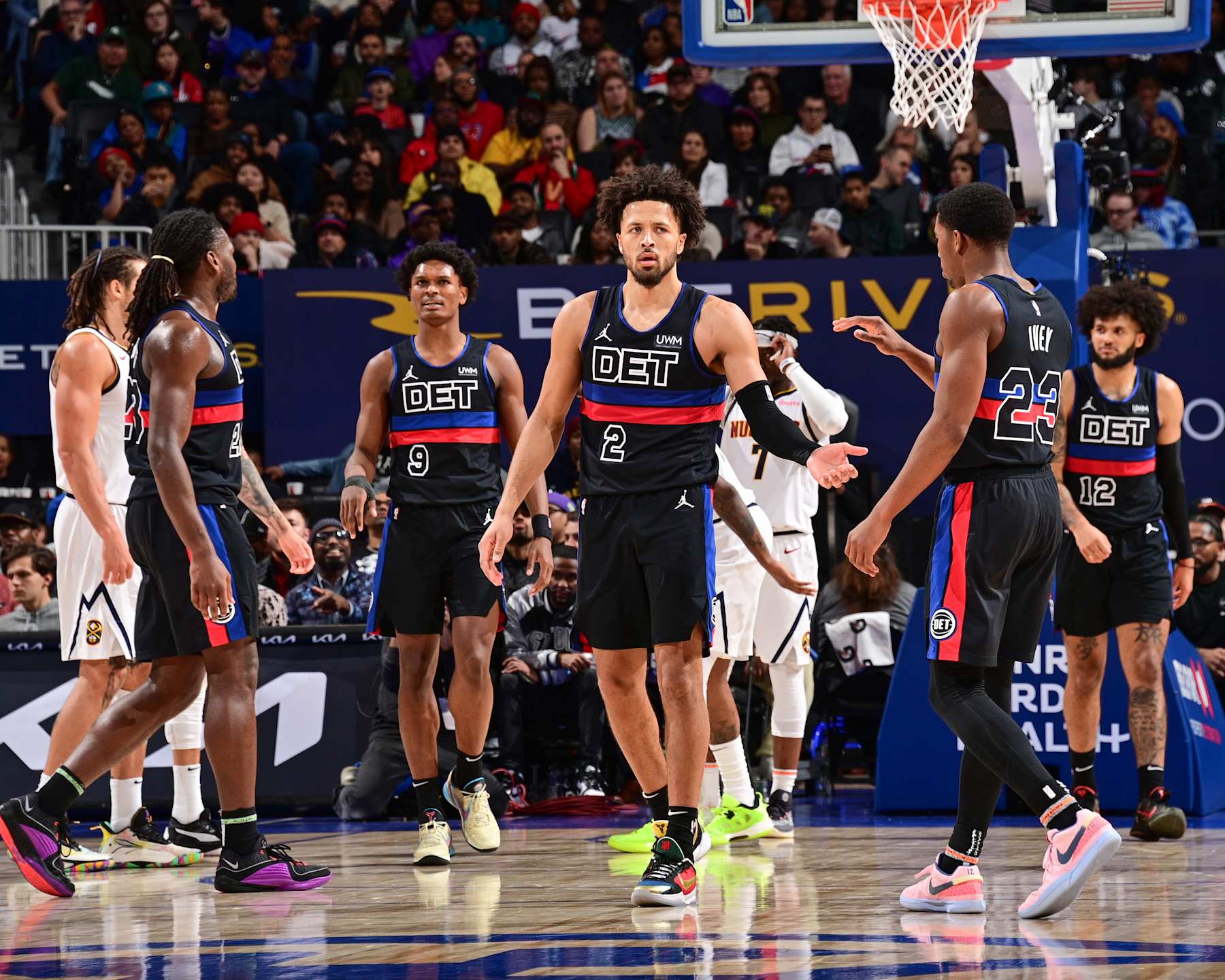 DETROIT, MI - NOVEMBER 20: Cade Cunningham #2 of the Detroit Pistons & Jaden Ivey #23 of the Detroit Pistons high five during the game on November 20, 2023 at Little Caesars Arena in Detroit, Michigan. NOTE TO USER: User expressly acknowledges and agrees that, by downloading and/or using this photograph, User is consenting to the terms and conditions of the Getty Images License Agreement. Mandatory Copyright Notice: Copyright 2023 NBAE (Photo by Chris Schwegler/NBAE via Getty Images)