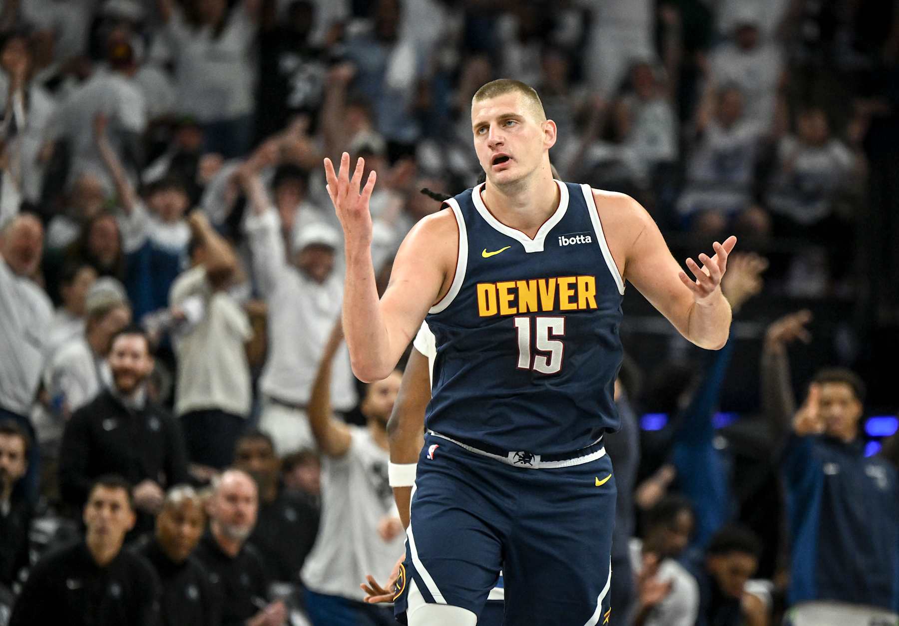 MINNEAPOLIS , MN - MAY 12: Nikola Jokic (15) of the Denver Nuggets reacts to giving up a three pointer by Naz Reid (11) of the Minnesota Timberwolves during the first quarter at Target Center in Minneapolis, Minnesota on Sunday, May 12, 2024. (Photo by AAron Ontiveroz/The Denver Post)