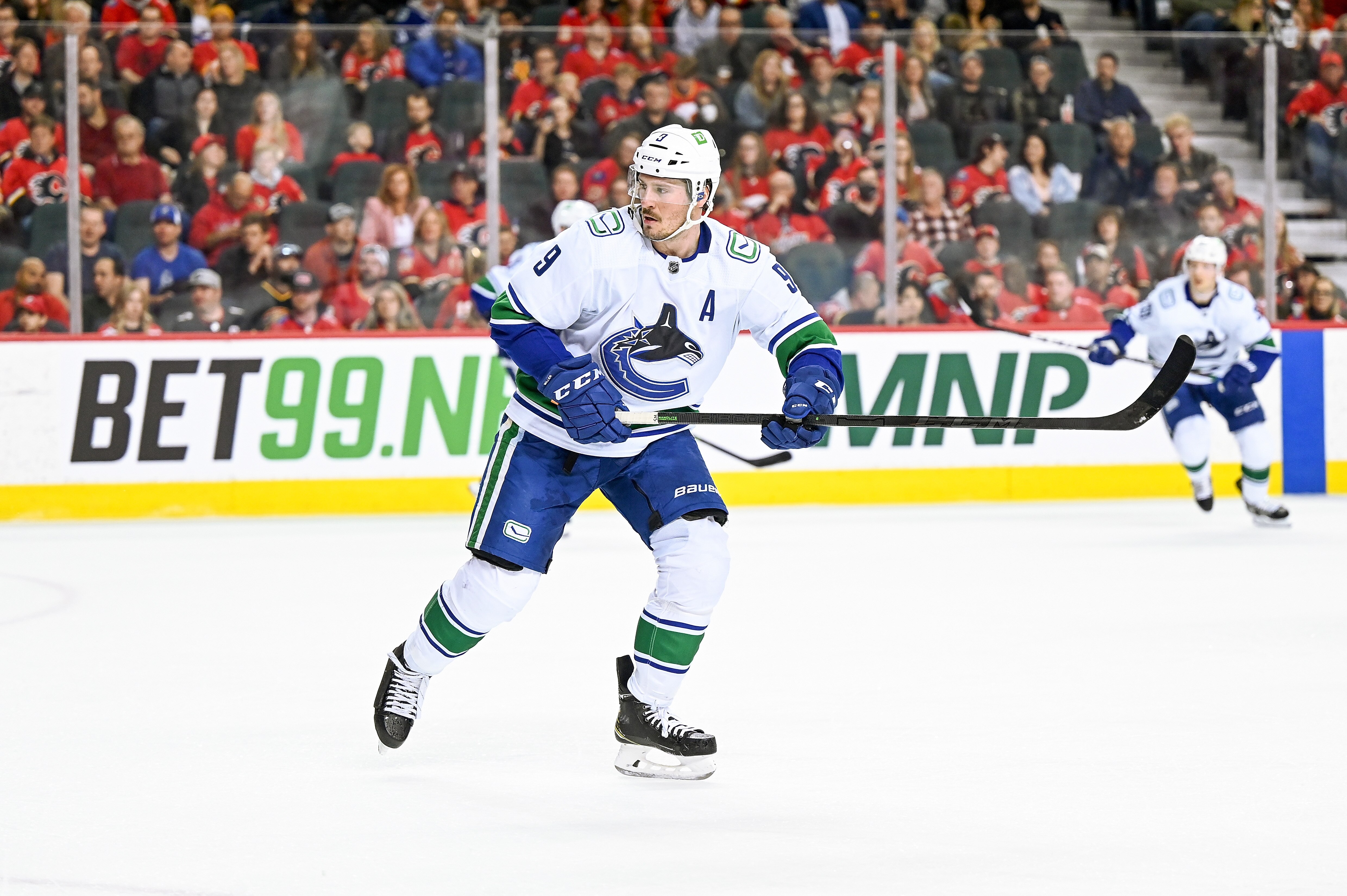 CALGARY, AB - APRIL 23: Vancouver Canucks Center J.T. Miller (9) in action during the first period of an NHL game where the Calgary Flames hosted the Vancouver Canucks on April 23, 2022, at the Scotiabank Saddledome in Calgary, AB. (Photo by Brett Holmes/Icon Sportswire via Getty Images)