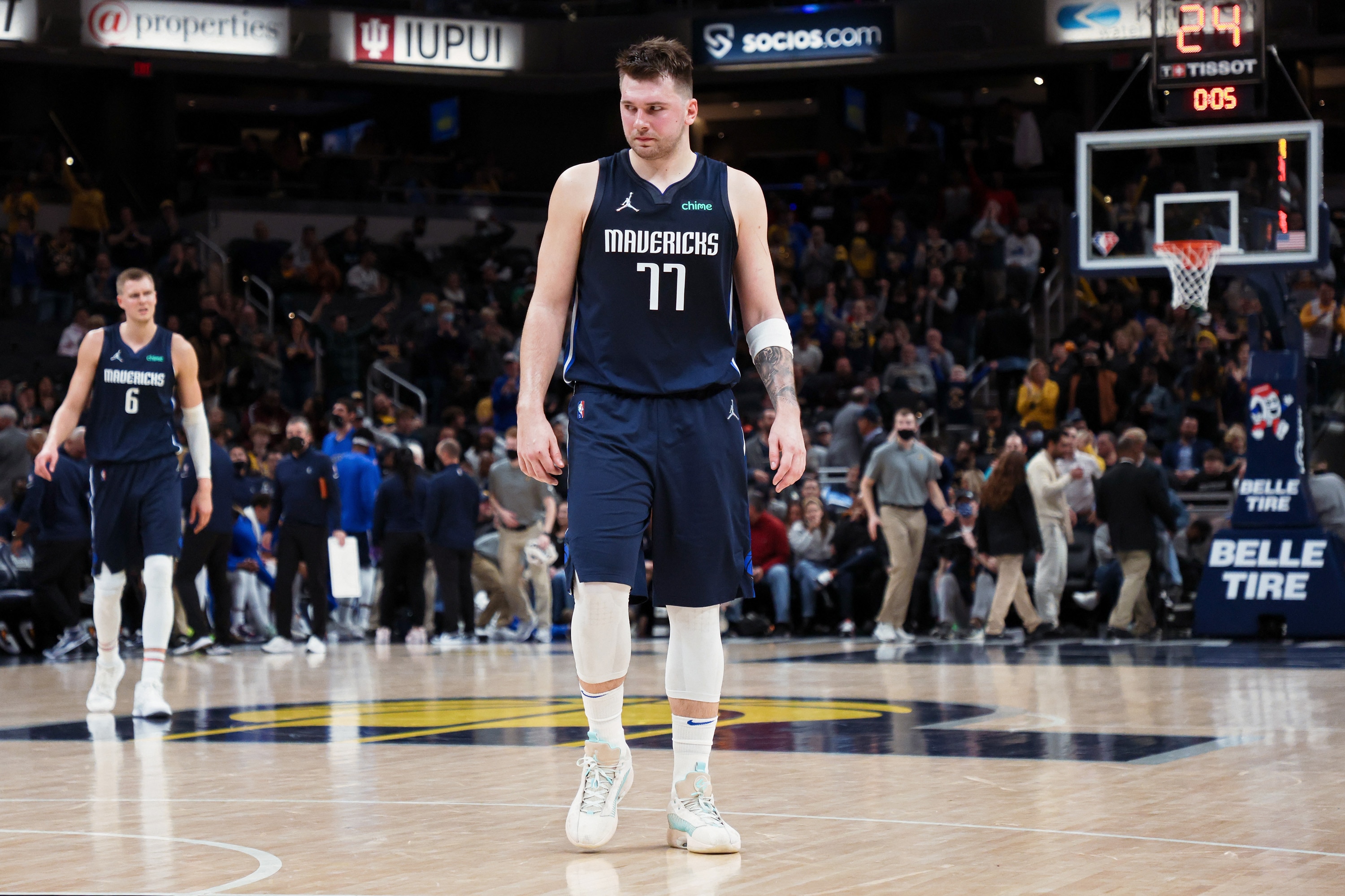INDIANAPOLIS, INDIANA - DECEMBER 10: Luka Doncic #77 of the Dallas Mavericks walks across the court in the fourth quarter against the Indiana Pacers at Gainbridge Fieldhouse on December 10, 2021 in Indianapolis, Indiana. NOTE TO USER: User expressly acknowledges and agrees that, by downloading and or using this Photograph, user is consenting to the terms and conditions of the Getty Images License Agreement. (Photo by Dylan Buell/Getty Images)
