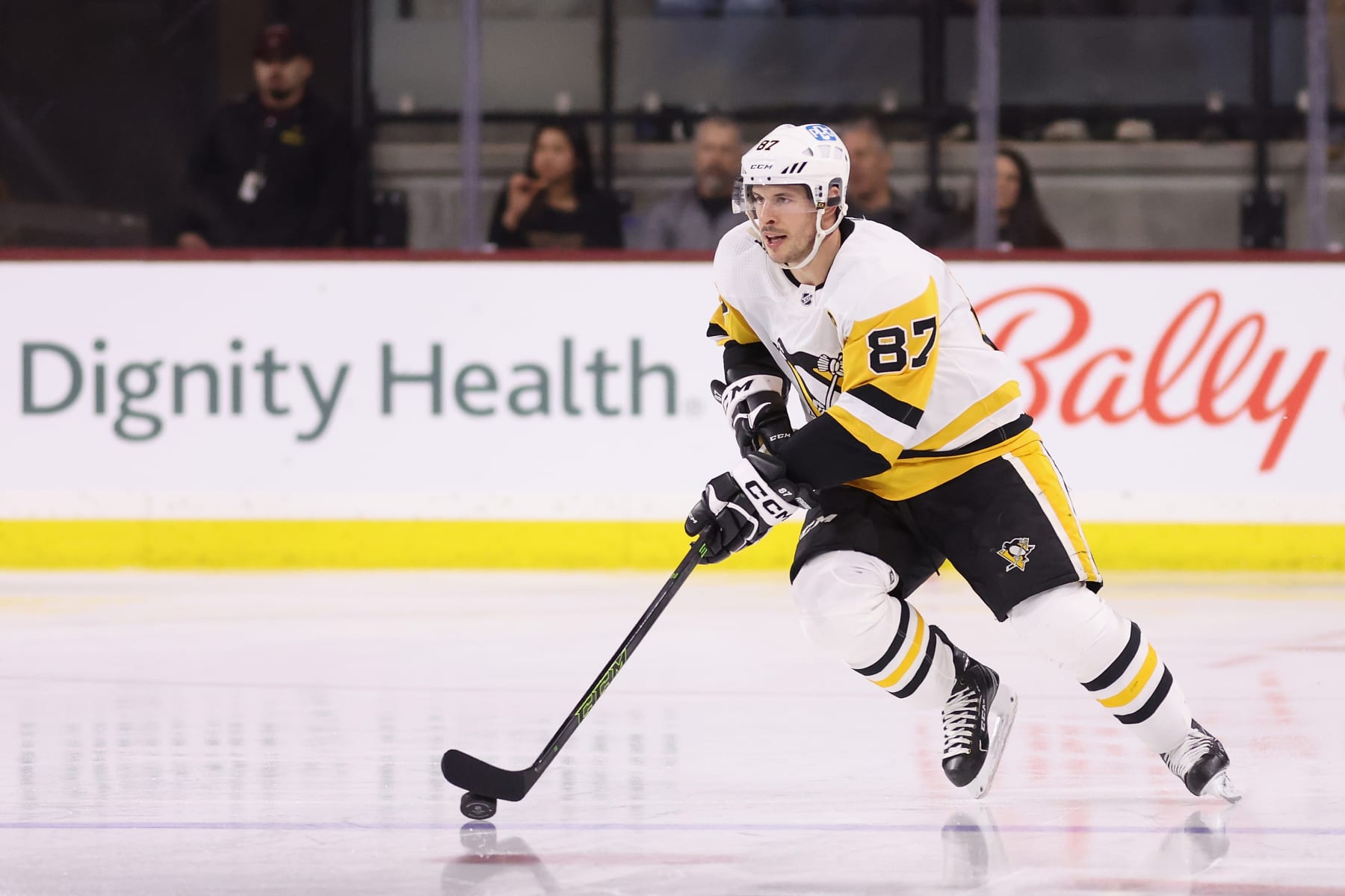 TEMPE, ARIZONA - JANUARY 08: Sidney Crosby #87 of the Pittsburgh Penguins skates with the puck during the third period of the NHL game against the Arizona Coyotes at Mullett Arena on January 08, 2023 in Tempe, Arizona. The Penguins defeated the Coyotes 4-1.  (Photo by Christian Petersen/Getty Images)