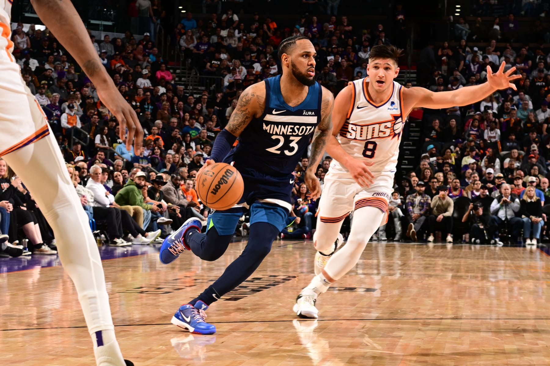 PHOENIX, AZ - APRIL 5: Monte Morris #23 of the Minnesota Timberwolves drives to the basket during the game against the Phoenix Suns on April 5, 2024 at Footprint Center in Phoenix, Arizona. NOTE TO USER: User expressly acknowledges and agrees that, by downloading and or using this photograph, user is consenting to the terms and conditions of the Getty Images License Agreement. Mandatory Copyright Notice: Copyright 2024 NBAE (Photo by Kate Frese/NBAE via Getty Images)