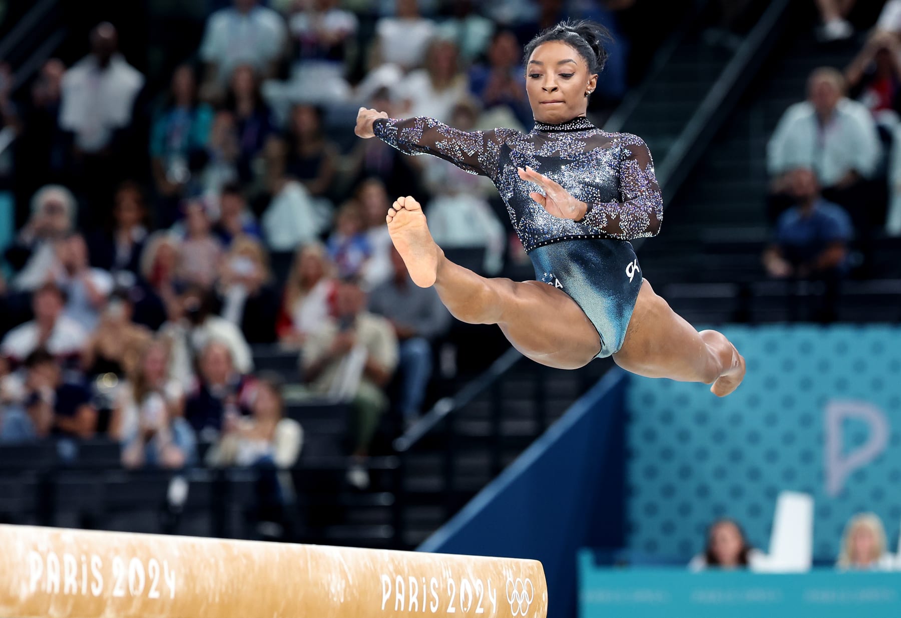 PARIS, FRANCE July 28, 2024-USA's Simone Biles competes on the beam during qualifying for women's team gymnastics at the 2024 Olympics in Paris, France Sunday(Wally Skalij/Los Angeles Times via Getty Images)