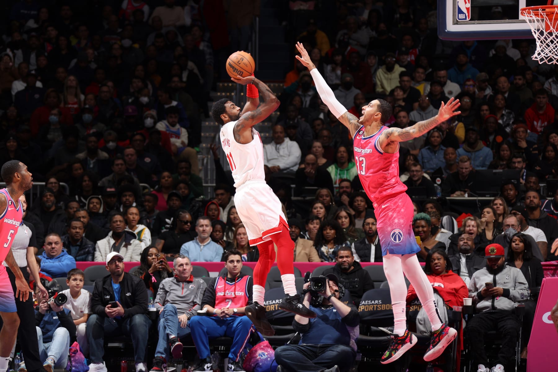 WASHINGTON, DC - DECEMBER 12: Kyrie Irving #11 of the Brooklyn Nets shoots the ball during the game against the Washington Wizards on December 12, 2022 at Capital One Arena in Washington, DC. NOTE TO USER: User expressly acknowledges and agrees that, by downloading and or using this Photograph, user is consenting to the terms and conditions of the Getty Images License Agreement. Mandatory Copyright Notice: Copyright 2022 NBAE (Photo by Stephen Gosling/NBAE via Getty Images)