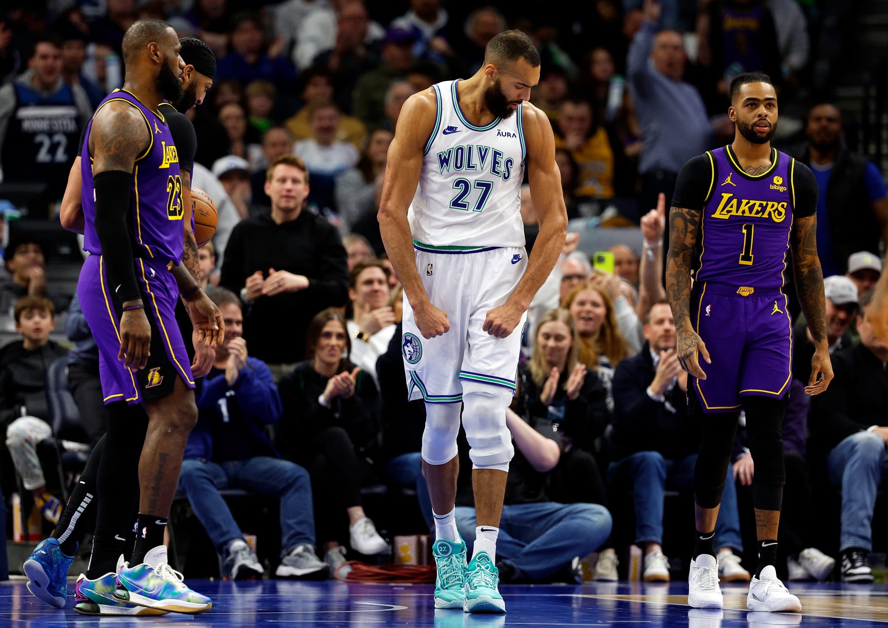MINNEAPOLIS, MINNESOTA - DECEMBER 30: Rudy Gobert #27 of the Minnesota Timberwolves celebrates drawing a foul against the Los Angeles Lakers in the third quarter at Target Center on December 30, 2023 in Minneapolis, Minnesota. The Timberwolves defeated the Lakers 108-106. NOTE TO USER: User expressly acknowledges and agrees that, by downloading and or using this photograph, User is consenting to the terms and conditions of the Getty Images License Agreement. (Photo by David Berding/Getty Images)